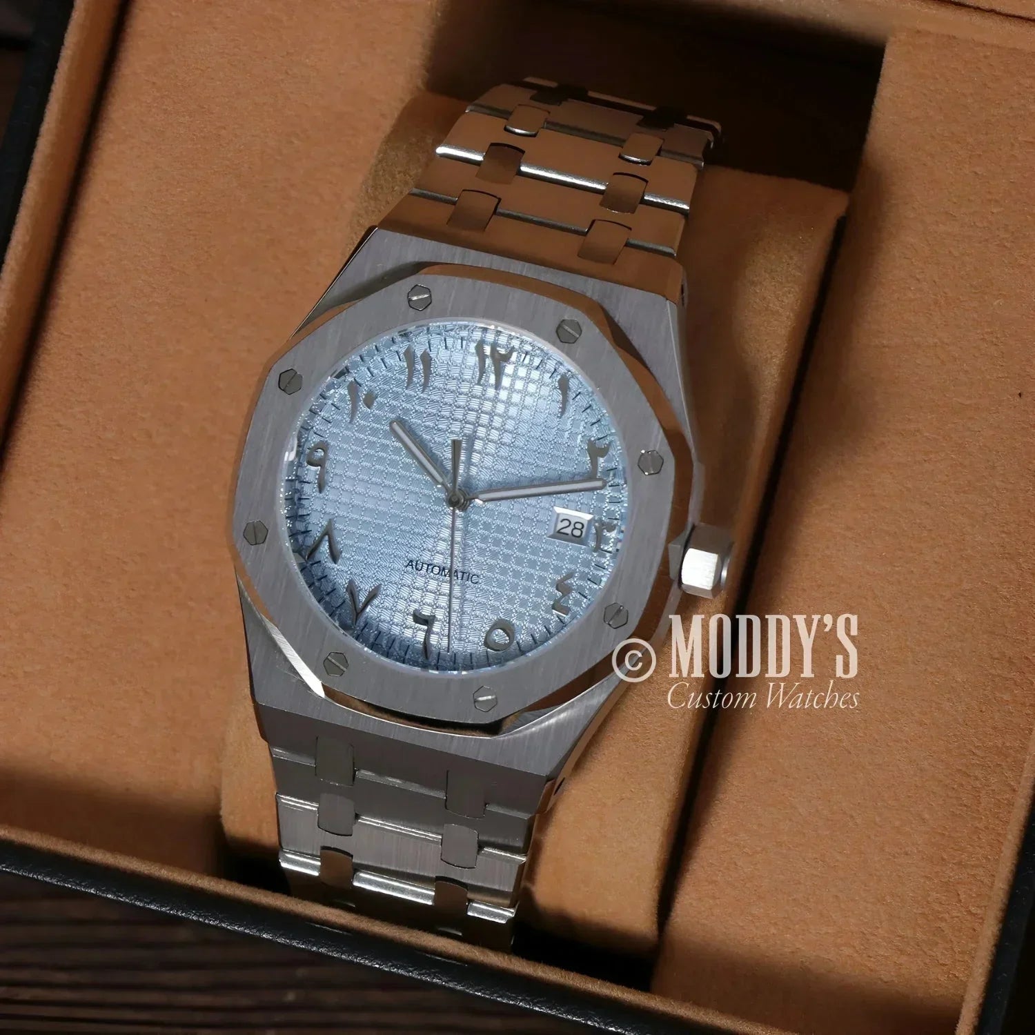 Silver wristwatch with Arabic numerals, Royal Seikoak featuring NH35 automatic movement
