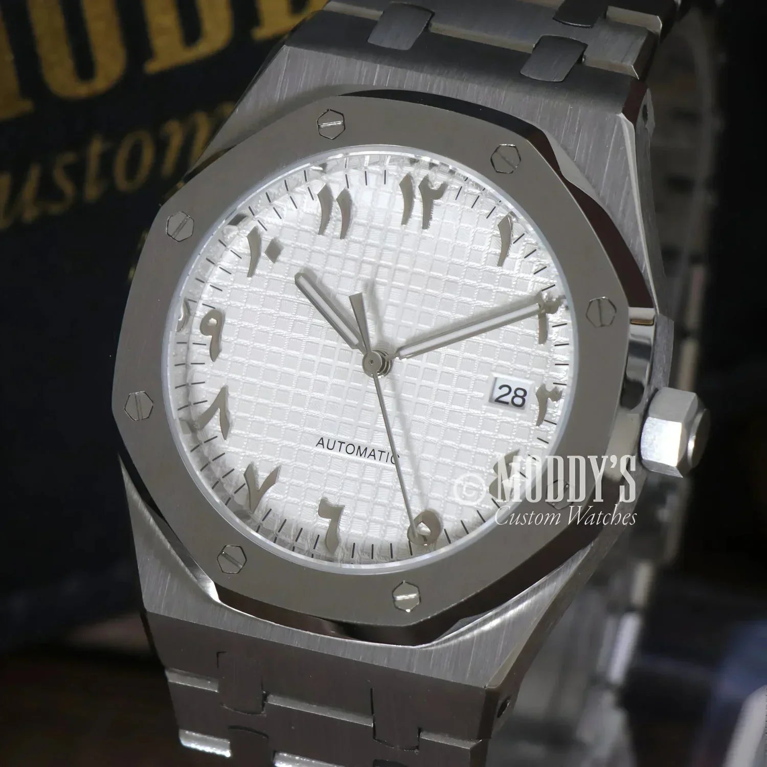 Silver Royal Seikoak wristwatch with Arabic numerals and Seiko NH35 automatic movement
