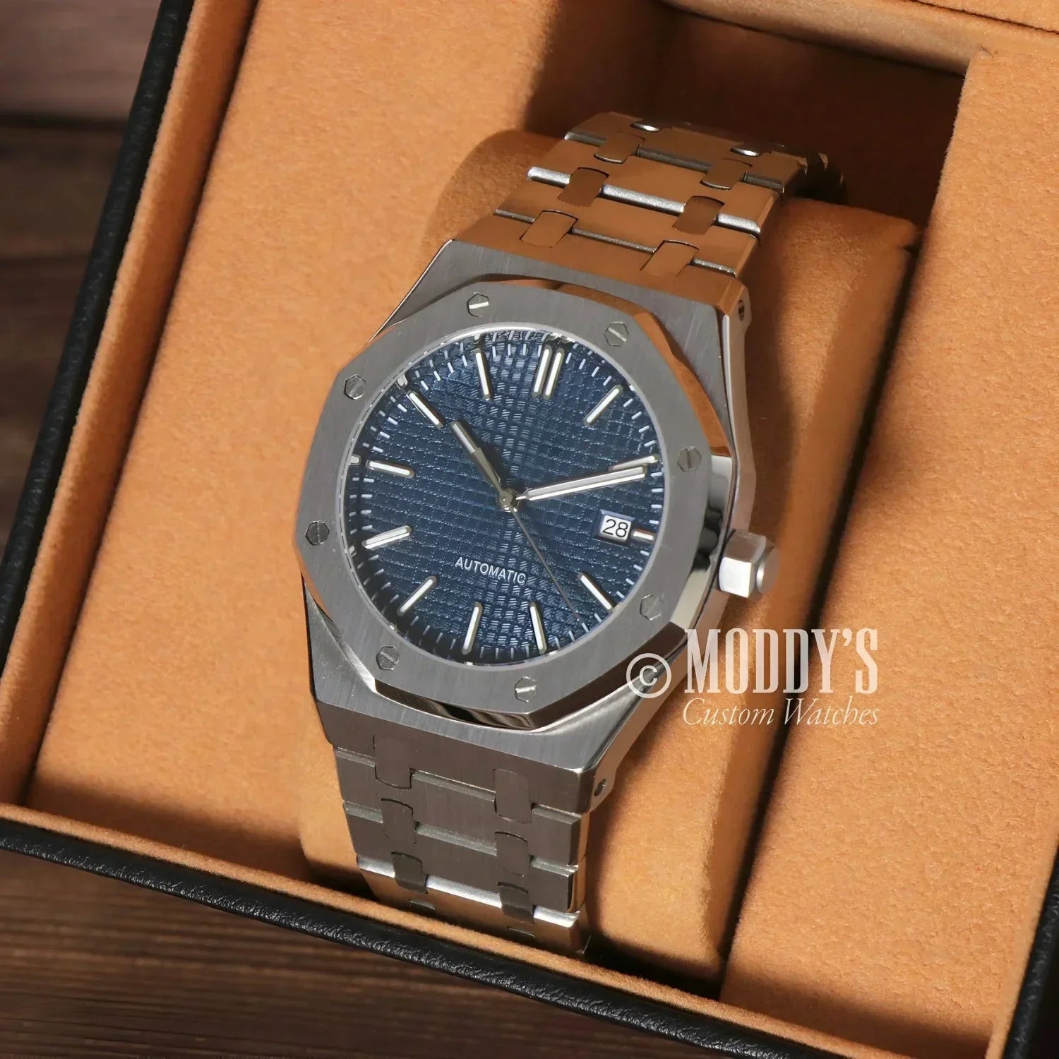 Silver automatic wristwatch with blue dial from Seiko Mod Royal Oak collection