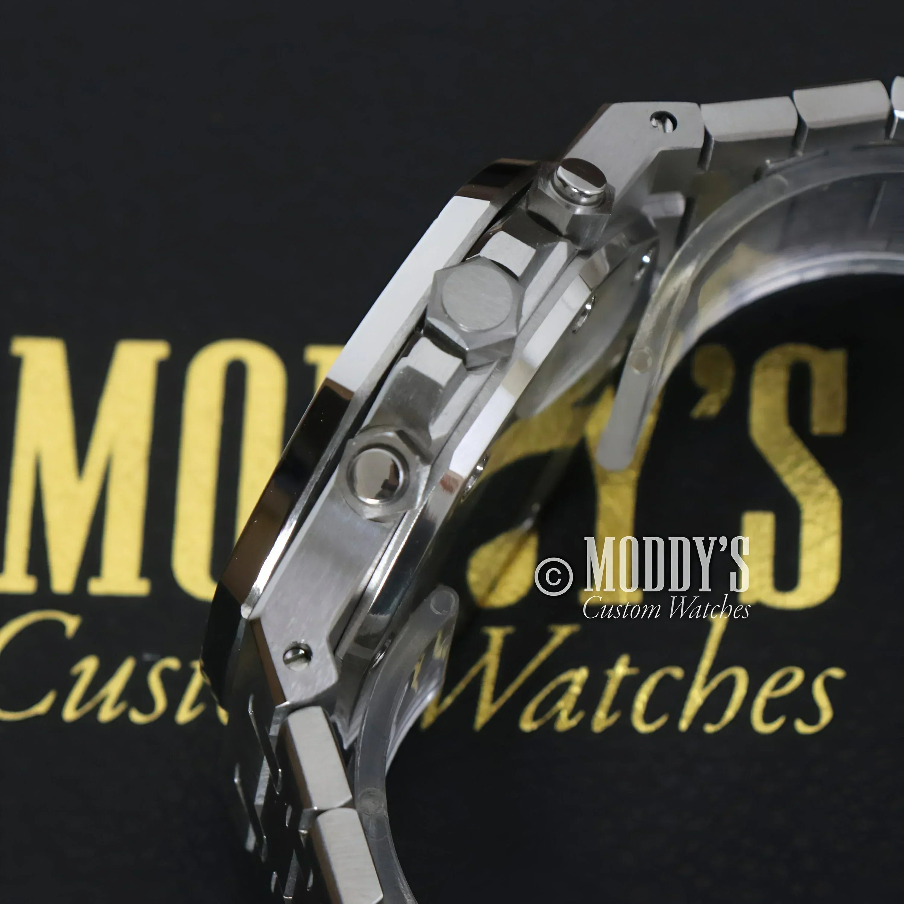 Silver wristwatch with metal band, Seiko Mod Royal Oak featuring VK63 hybrid movement