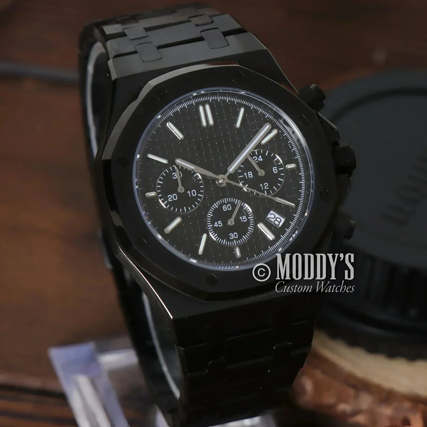 Black chronograph wristwatch from Royal Seikoak featuring Seiko VK63 hybrid movement