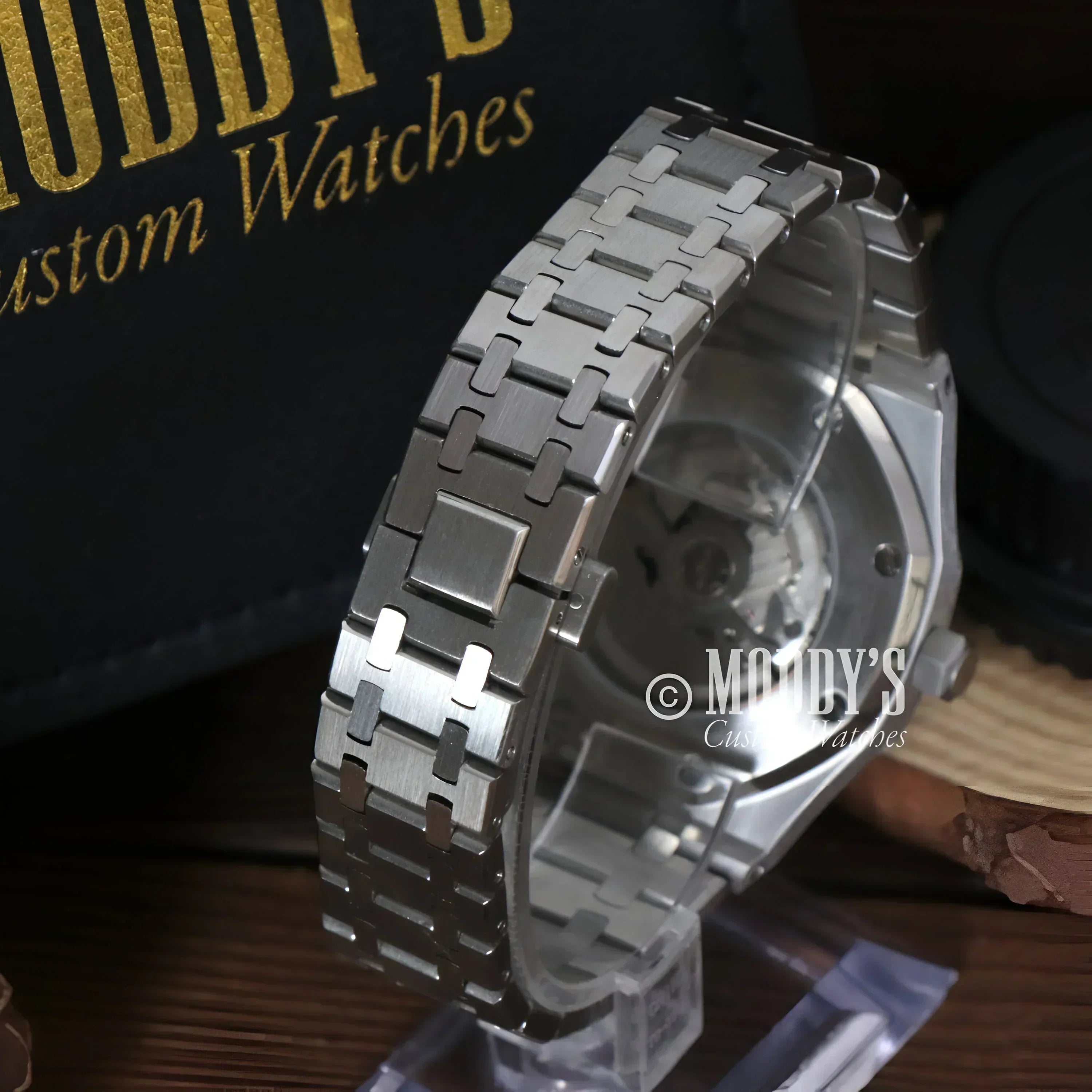 Silver wristwatch with metal band, Royal Seikoak featuring NH35 automatic movement
