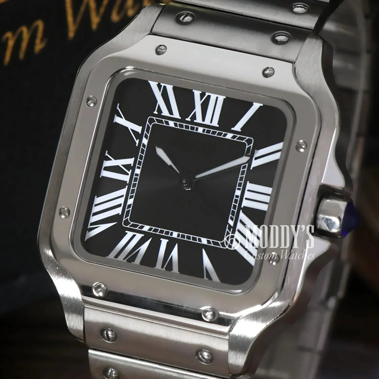 Silver square wristwatch with black face, featuring NH35 automatic movement and 316L stainless steel
