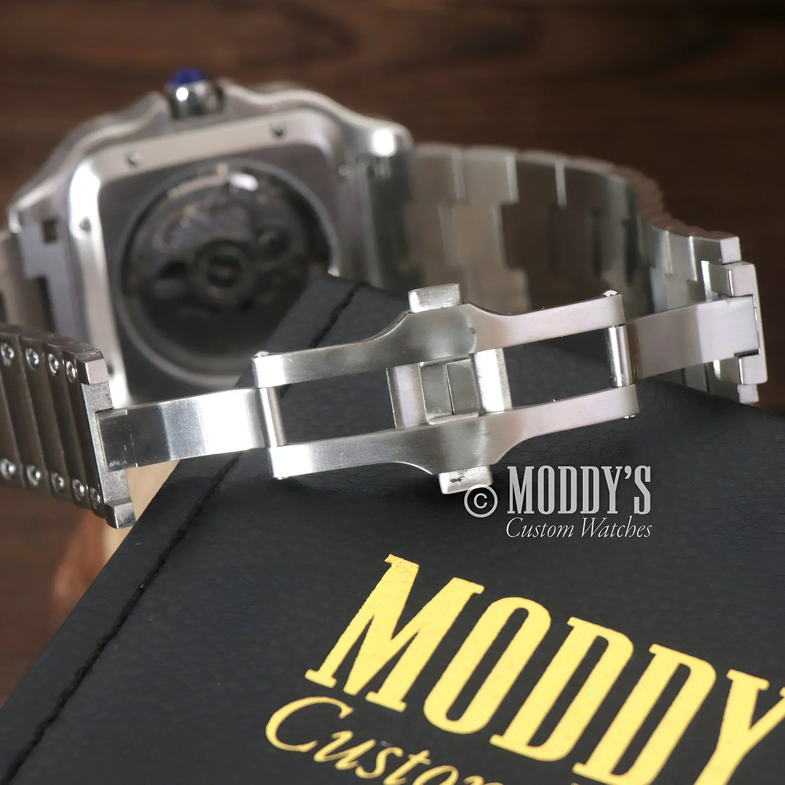 Silver metal watch with deployment clasp featuring NH35 automatic movement, 316L stainless steel