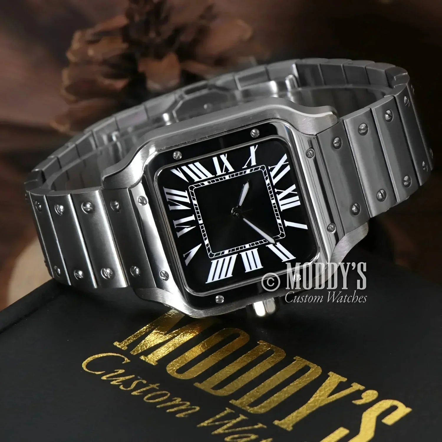 Silver wristwatch with black face featuring NH35 automatic movement and 316L stainless steel