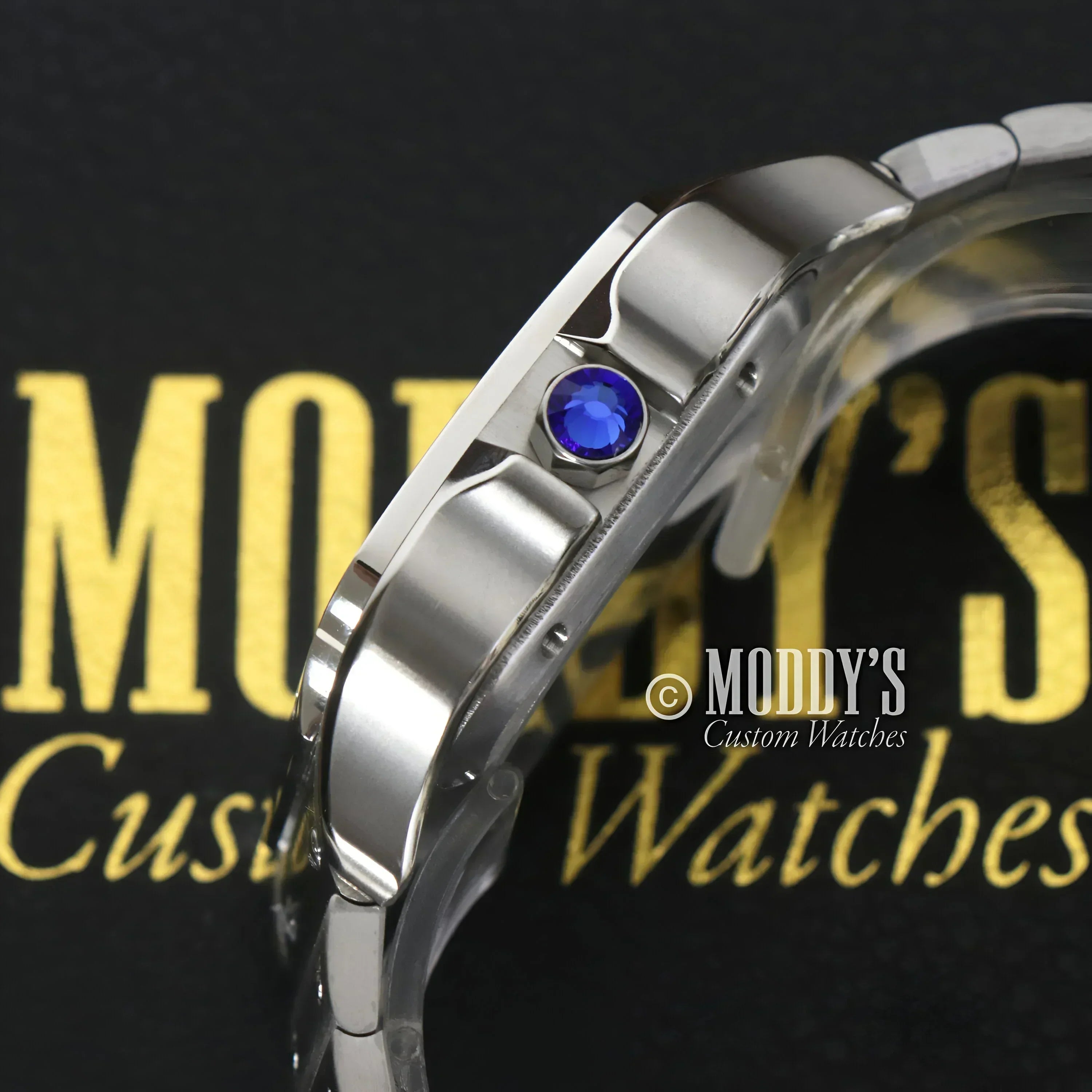 Silver wristwatch with blue jewel featuring Seiko NH35 automatic movement Santeiko White