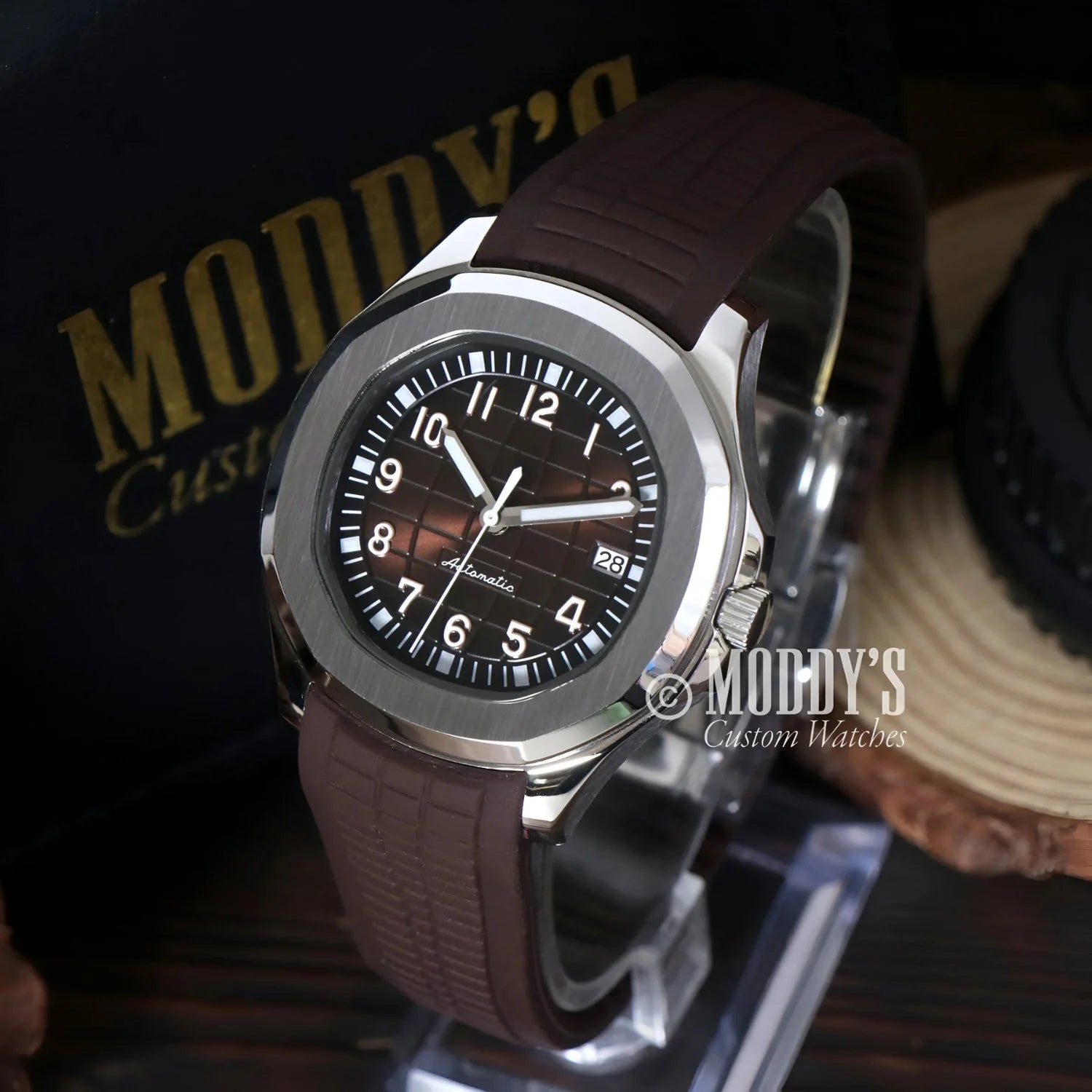 Silver Seikonaut wristwatch with brown band and NH35 automatic movement