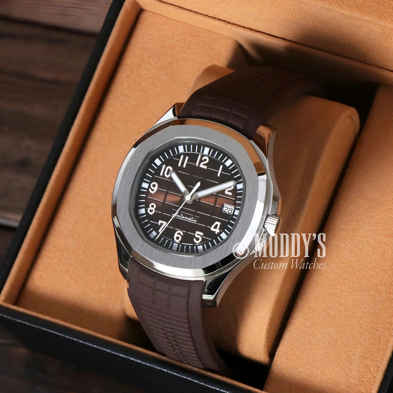 Silver-cased wristwatch with brown band featuring NH35 automatic movement, Seiko Mod Aquanaut