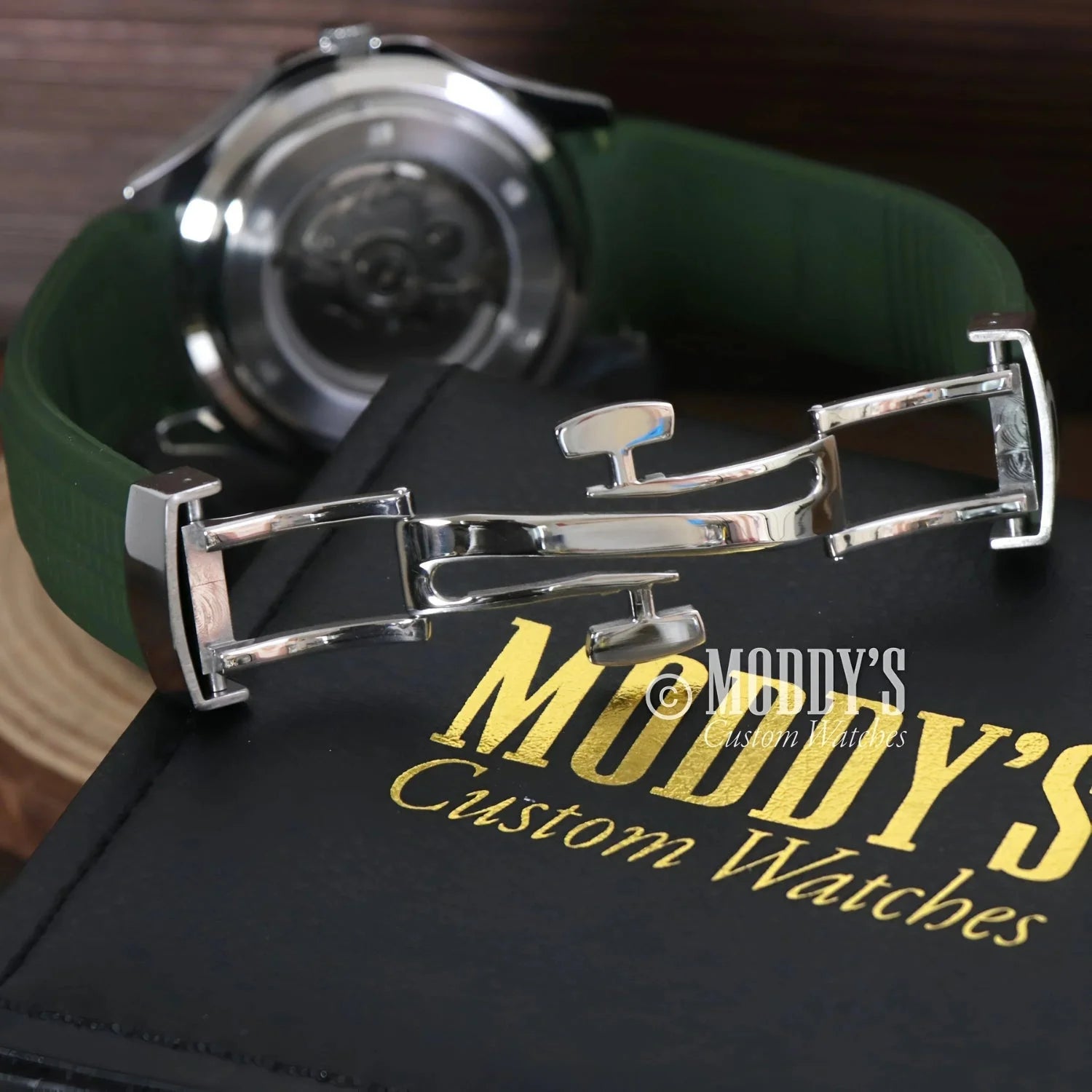 Silver watch clasp with green band from Seikonaut featuring NH35 automatic movement