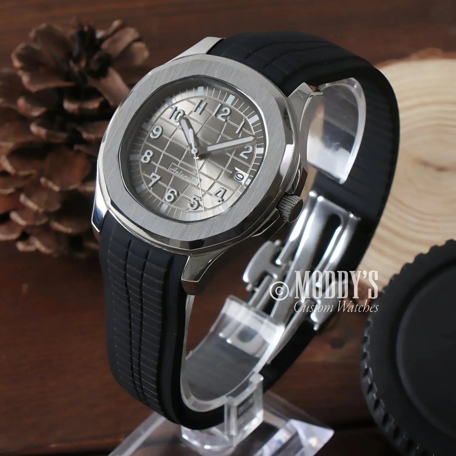 Silver Seikonaut wristwatch with black rubber strap and NH35 automatic movement