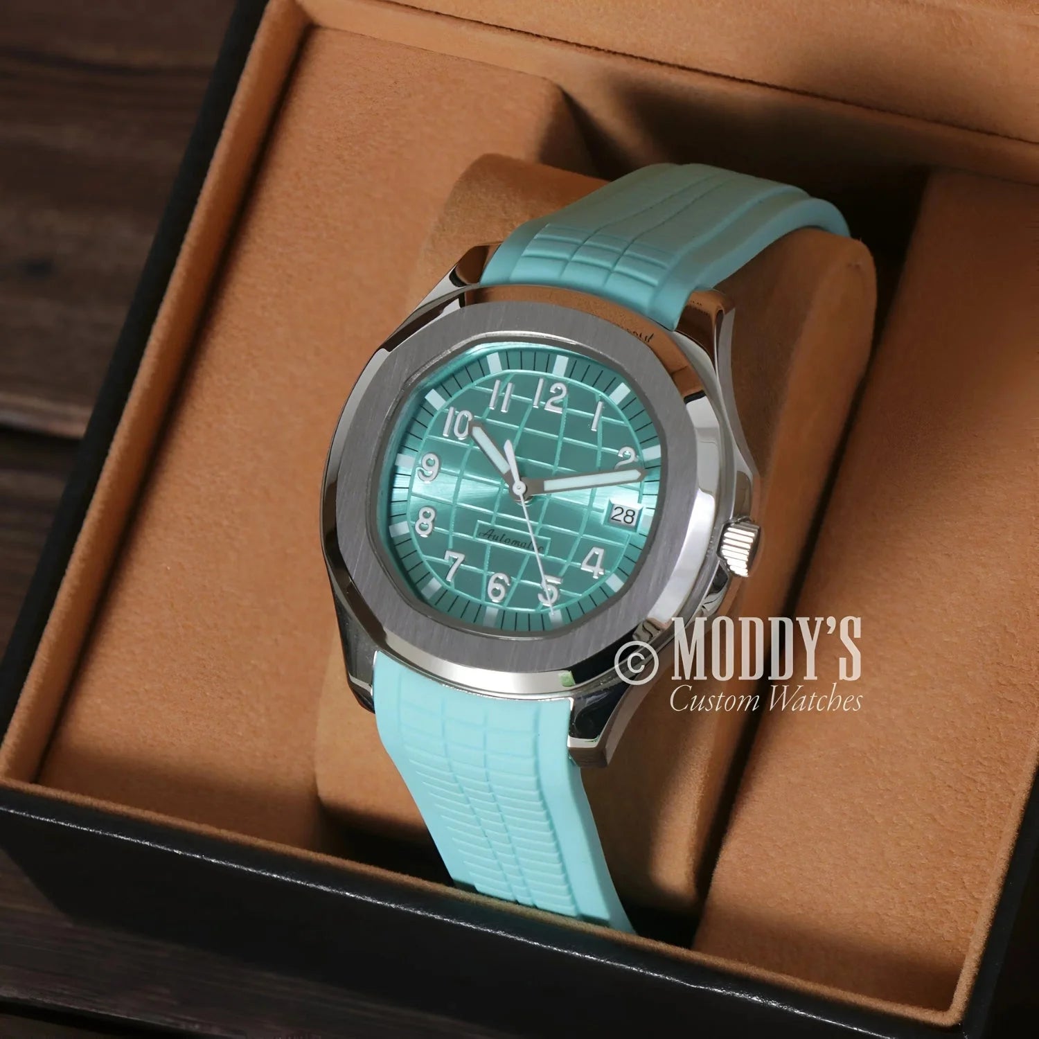 Silver watch with turquoise band and face, Seikonaut in Tiffany Metallic Blue style