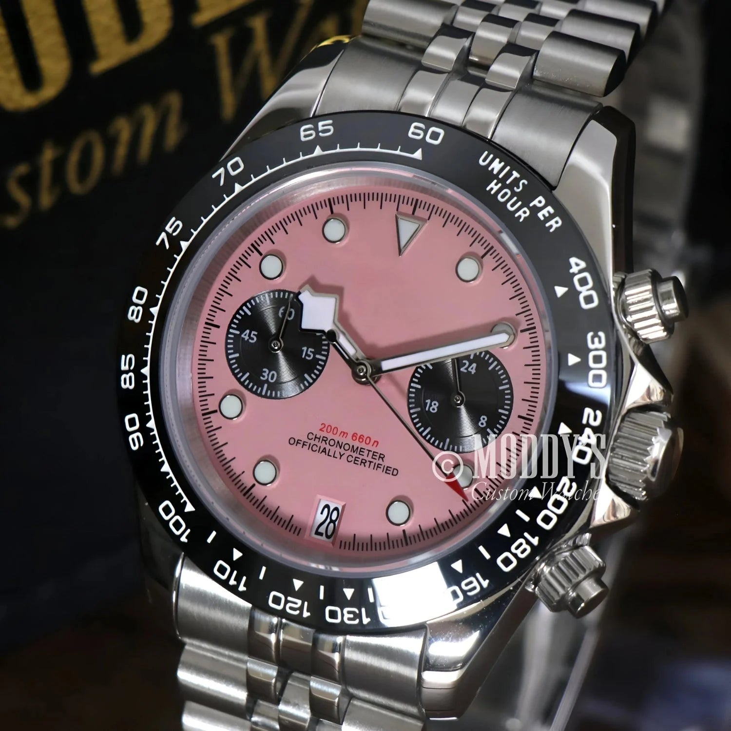 Pink-faced Tudeiko Chrono Pink wristwatch with stainless steel band and Seiko VK63 hybrid movement