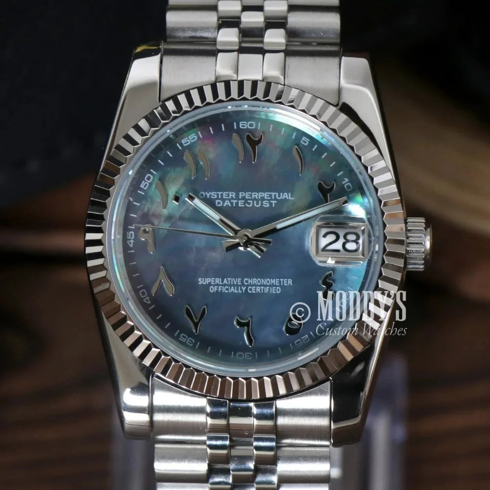 Silver Seikojust Arabic Cosmos wristwatch featuring Arabic numerals and Seiko NH35 Automatic