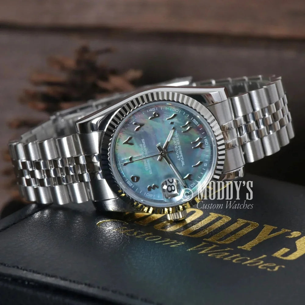 Silver Seikojust Arabic Cosmos wristwatch with Arabic numerals and Seiko NH35 Automatic