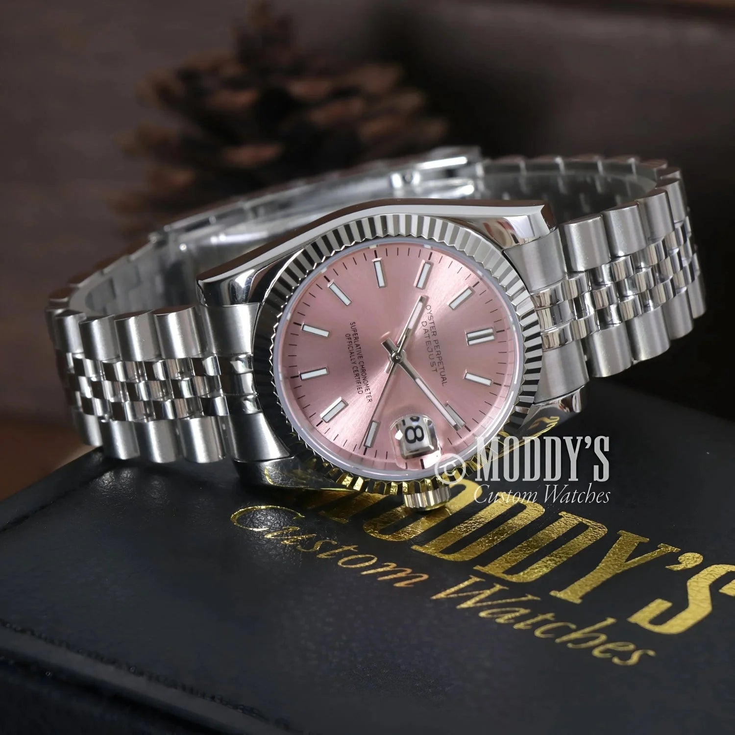 Silver wristwatch with pink face, Seiko NH35 automatic, crafted in 904L stainless steel