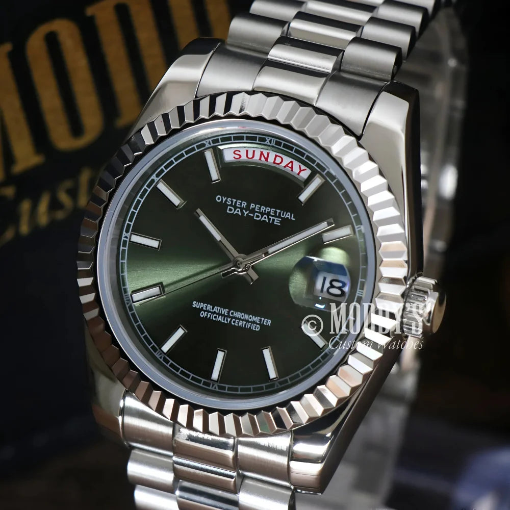 Silver wristwatch with green face from Seikojust, featuring 904L stainless steel and Daydate Mint Green