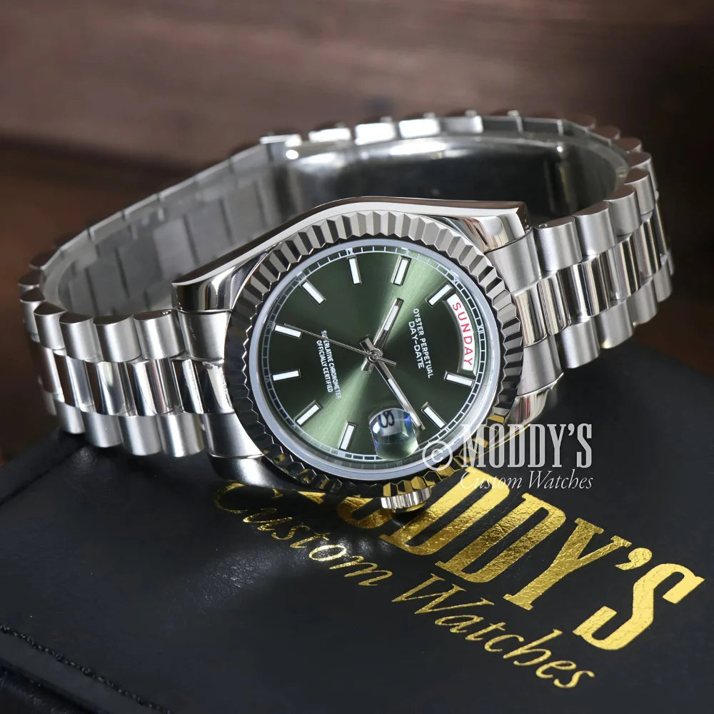 Silver Seikojust Daydate Mint Green wristwatch with a green face and 904L stainless steel