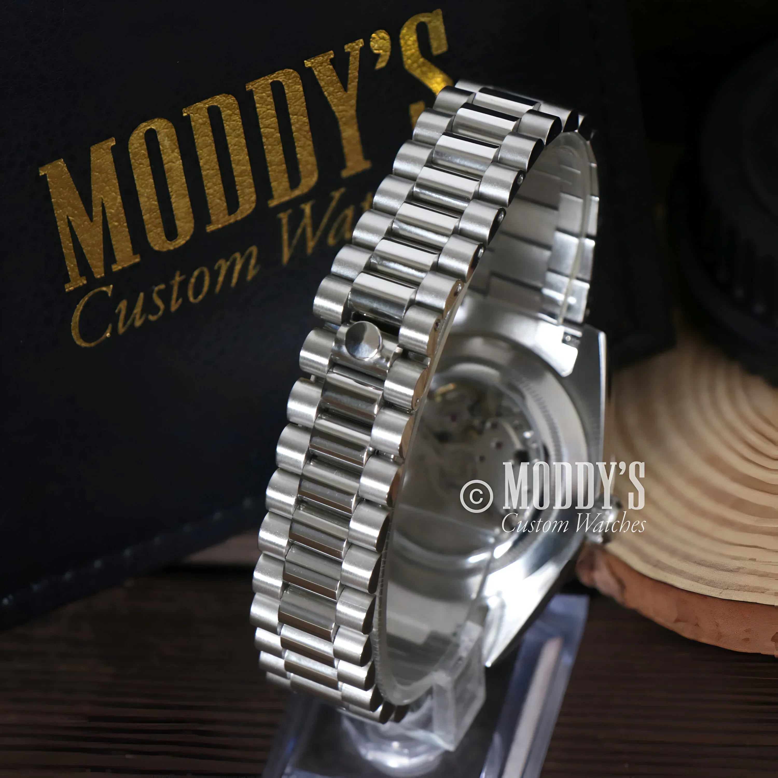 Silver Seiko Mod wristwatch with 904L stainless steel band and Daydate Mint Green design