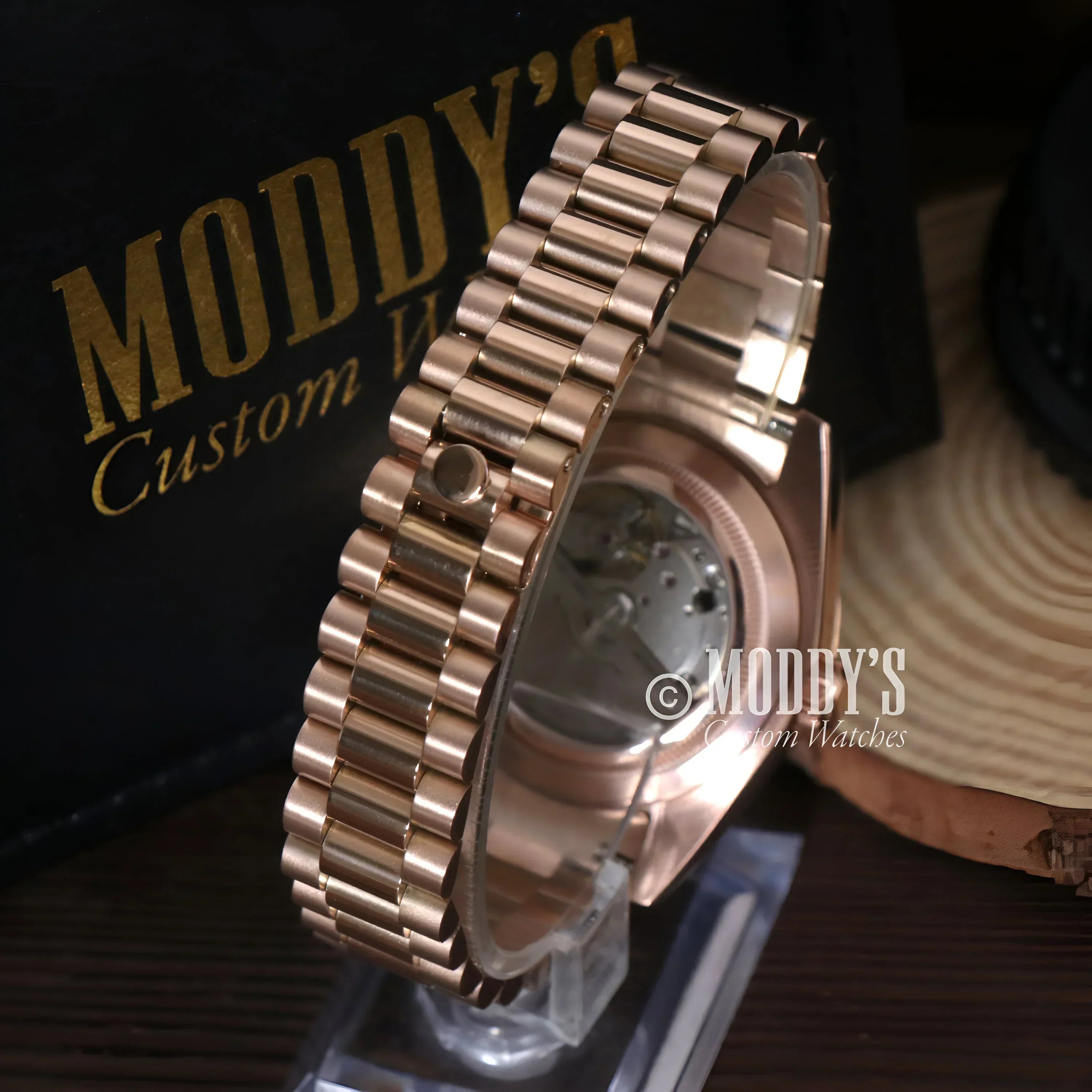 Daydate Rose Gold Seiko Mod wristwatch featuring white Arabic numerals and 904L stainless steel