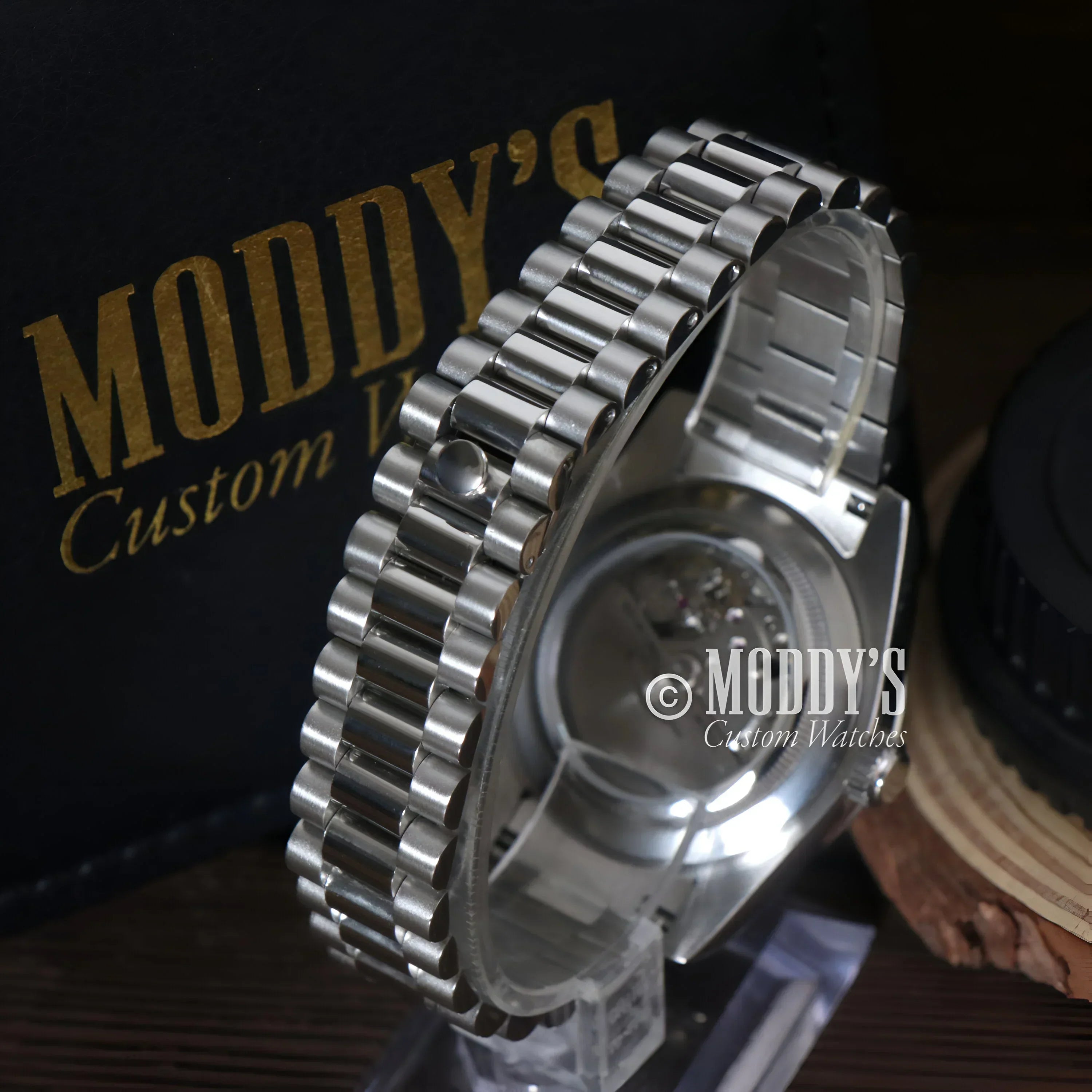Silver wristwatch with metal band, Seiko Mod, featuring Daydate Royal Blue and 904L stainless steel