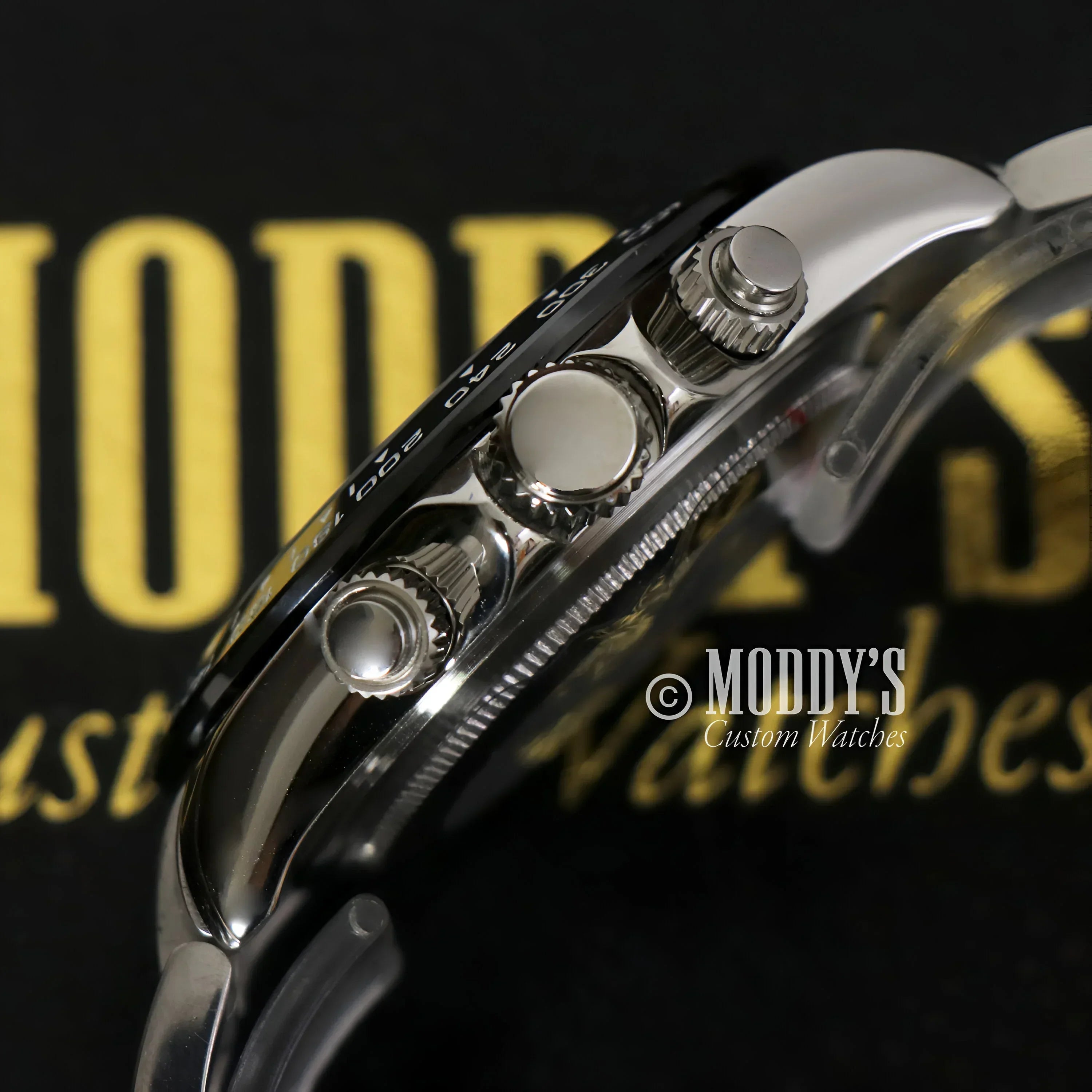 Silver chronograph wristwatch from Seitona Black Panda featuring VK63 hybrid movement