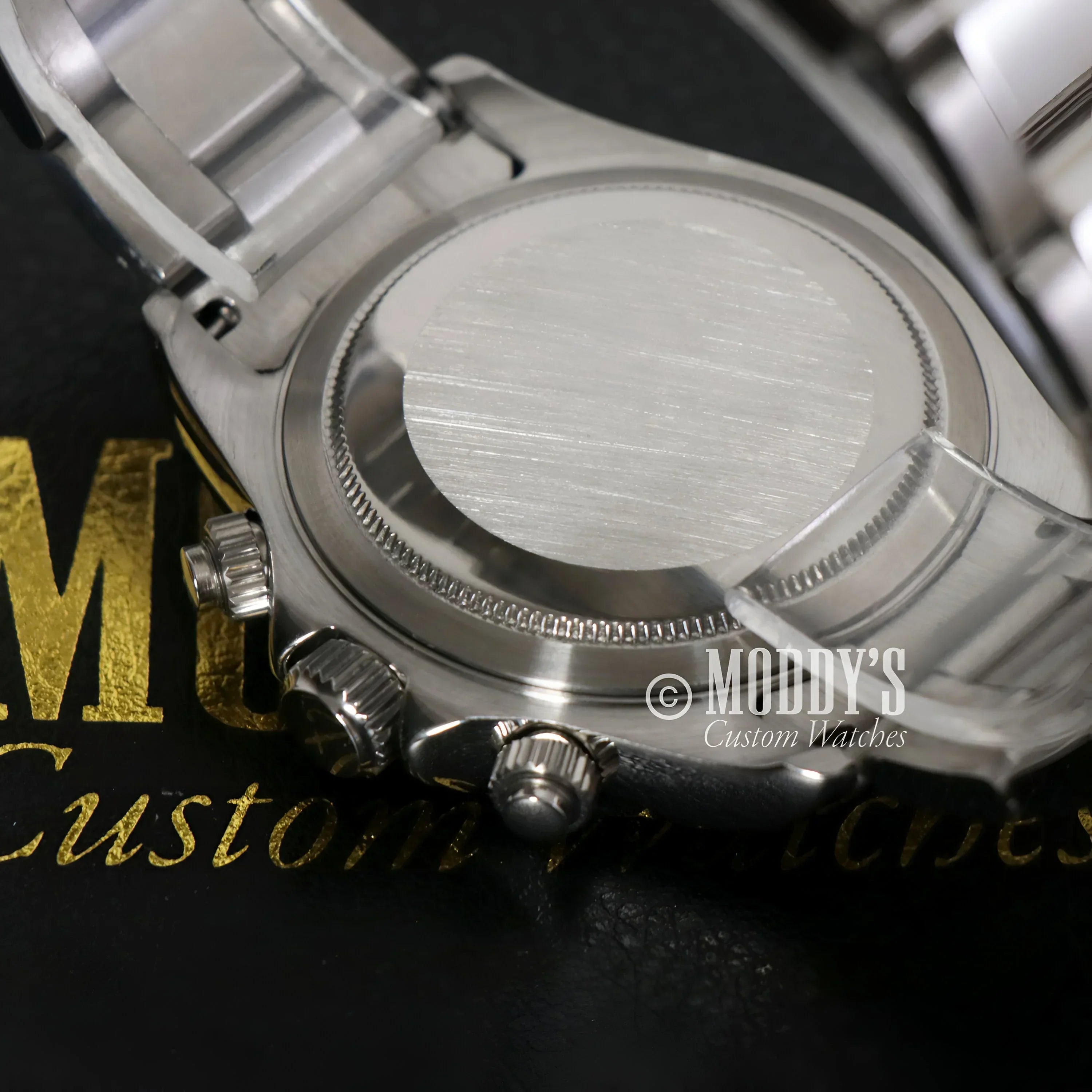Silver wristwatch back of Seitona Champagne featuring Seiko VK63 hybrid movement