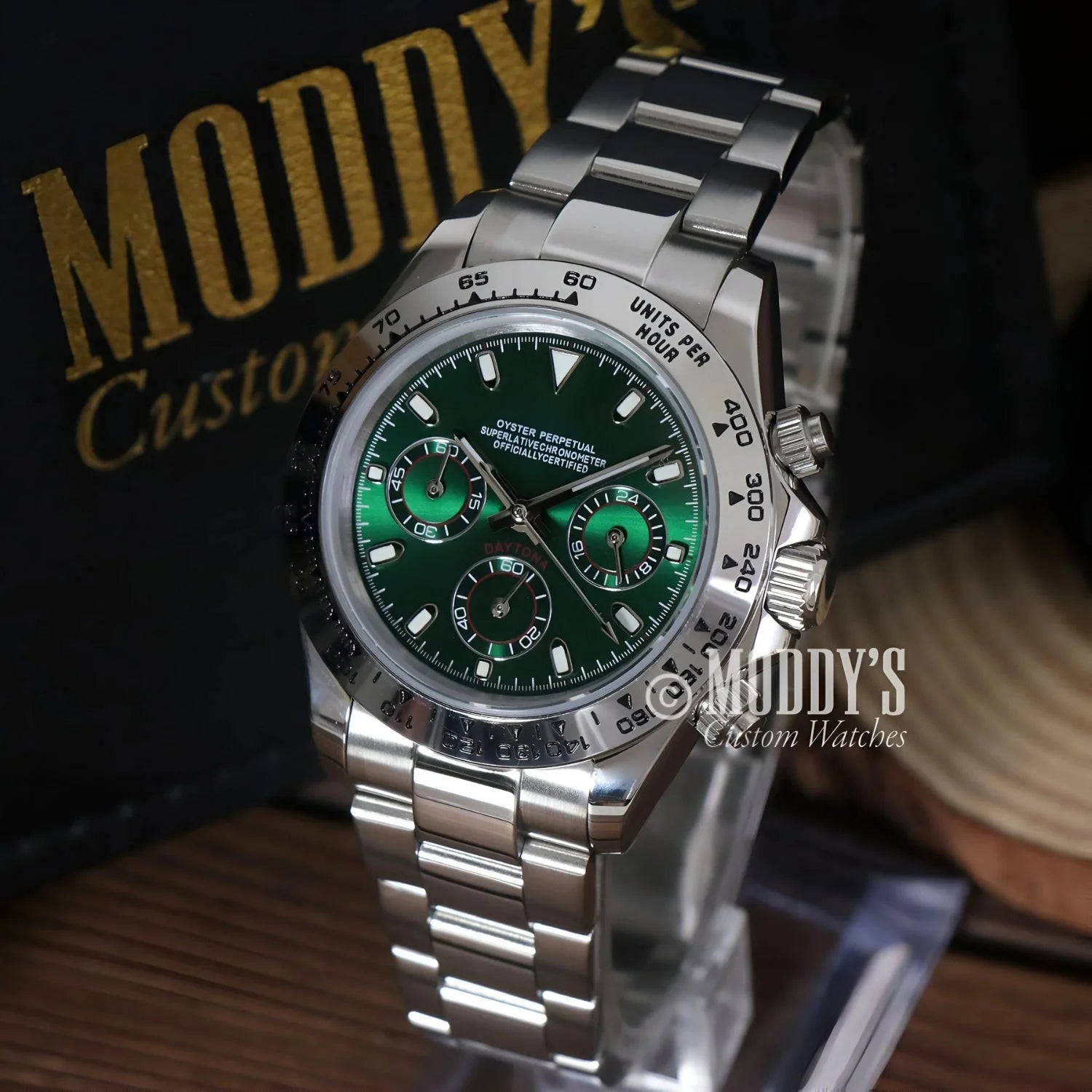 Silver wristwatch with green face featuring Seiko VK63 hybrid movement, Seitona design
