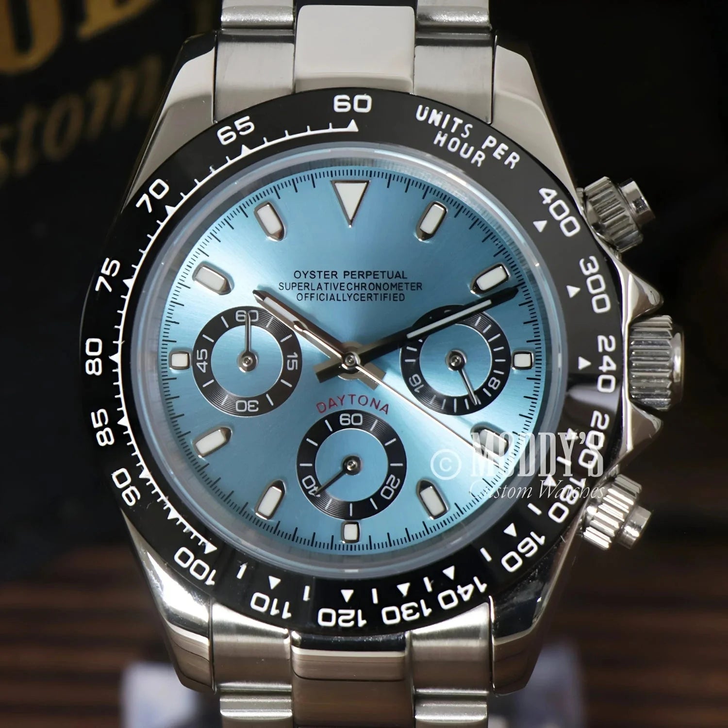 Silver Rolex Daytona watch with light blue face, featuring VK63 hybrid movement, Ice Blue
