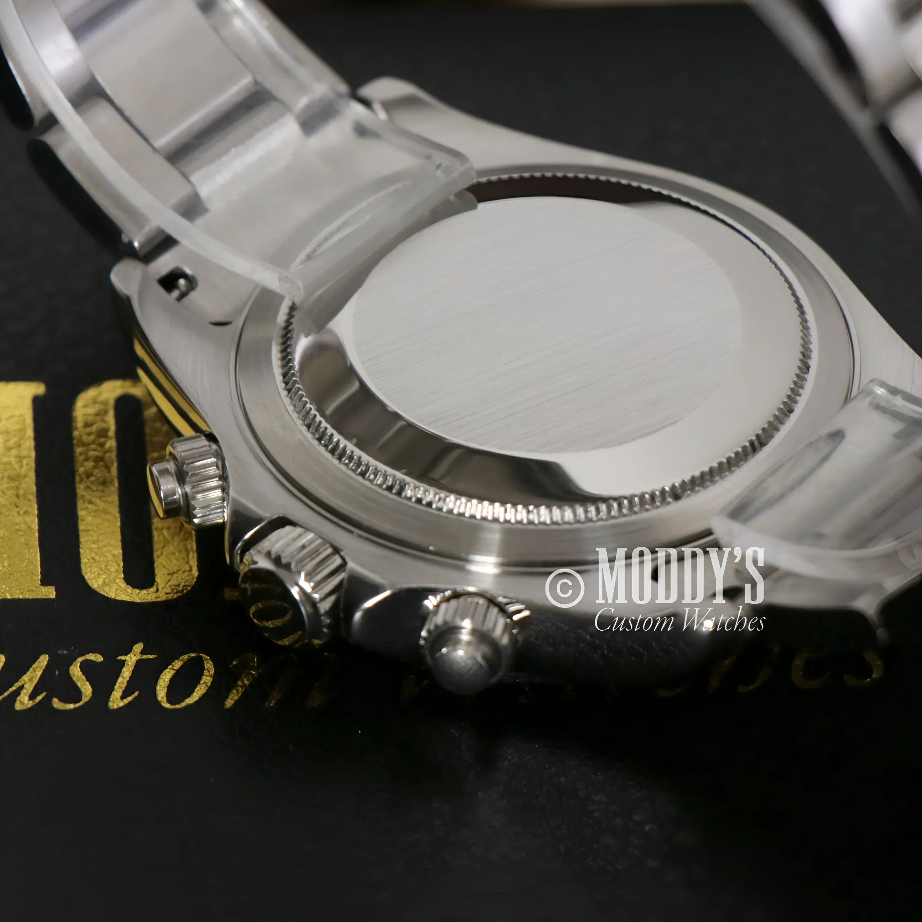 Silver wristwatch with protective plastic from Seitona featuring Ice Blue and VK63 hybrid movement