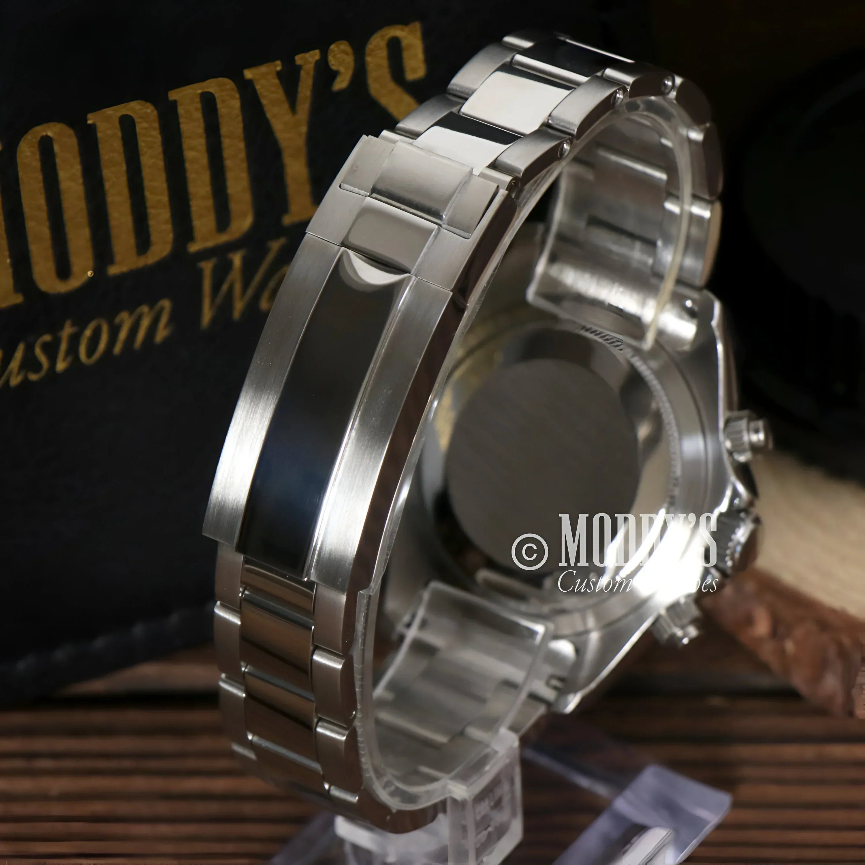 Silver wristwatch with metal band featuring VK63 hybrid movement and Ice Blue dial