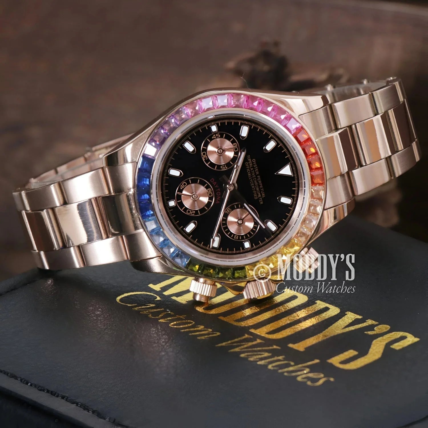 Rose Gold Rainbow watch features a rainbow gemstone bezel and Seiko VK63 hybrid movement