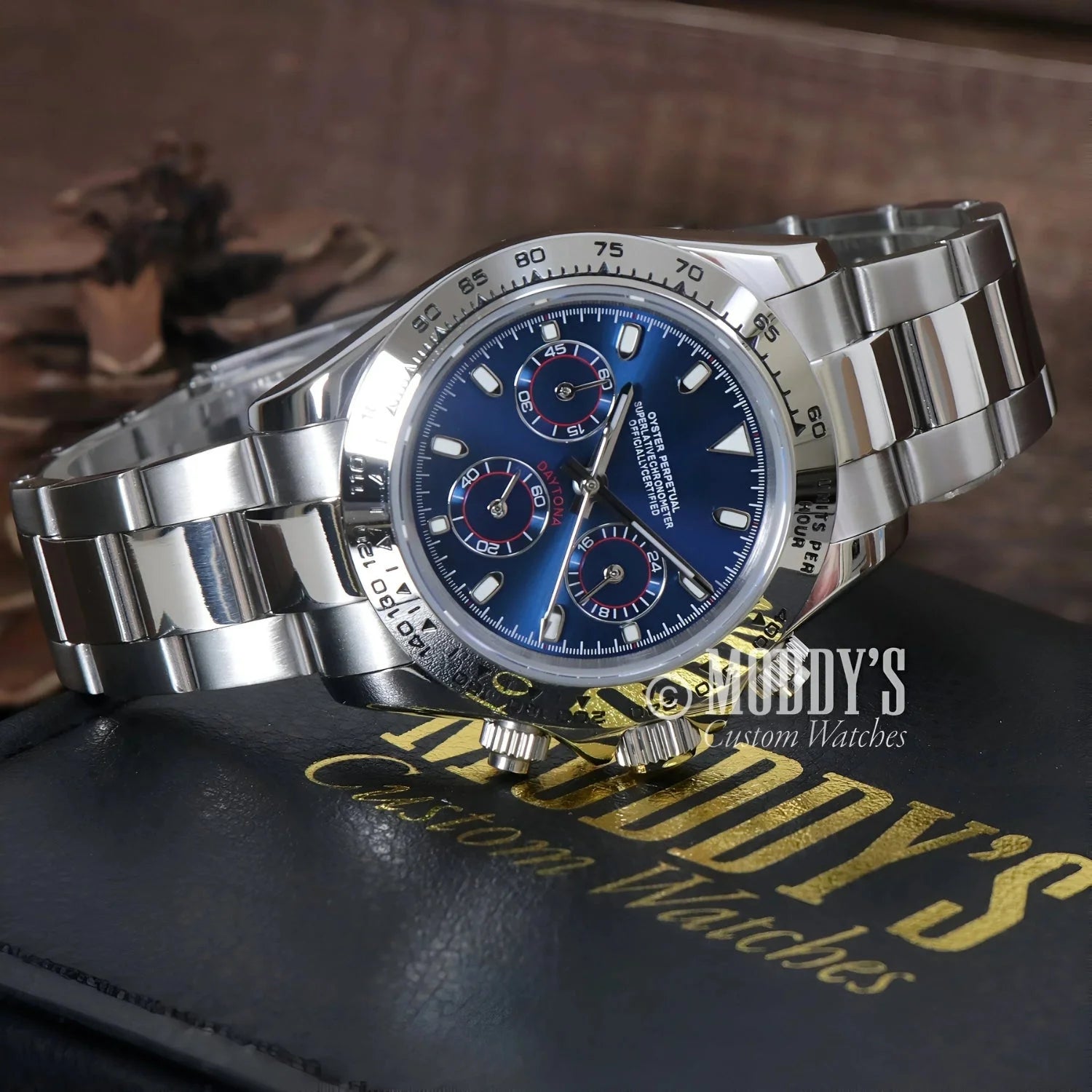 Silver wristwatch with blue face featuring Seiko VK63 hybrid movement in Seitona