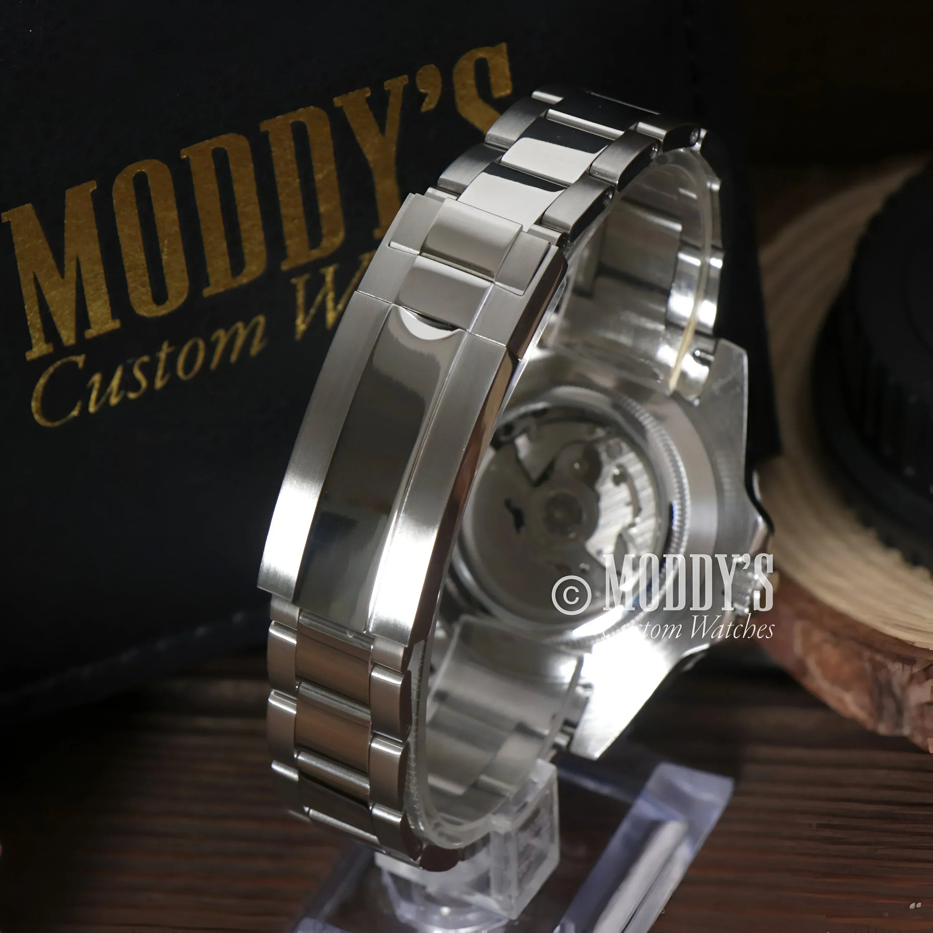Silver GMTeiko Coke wristwatch with NH34 automatic movement and exposed mechanism