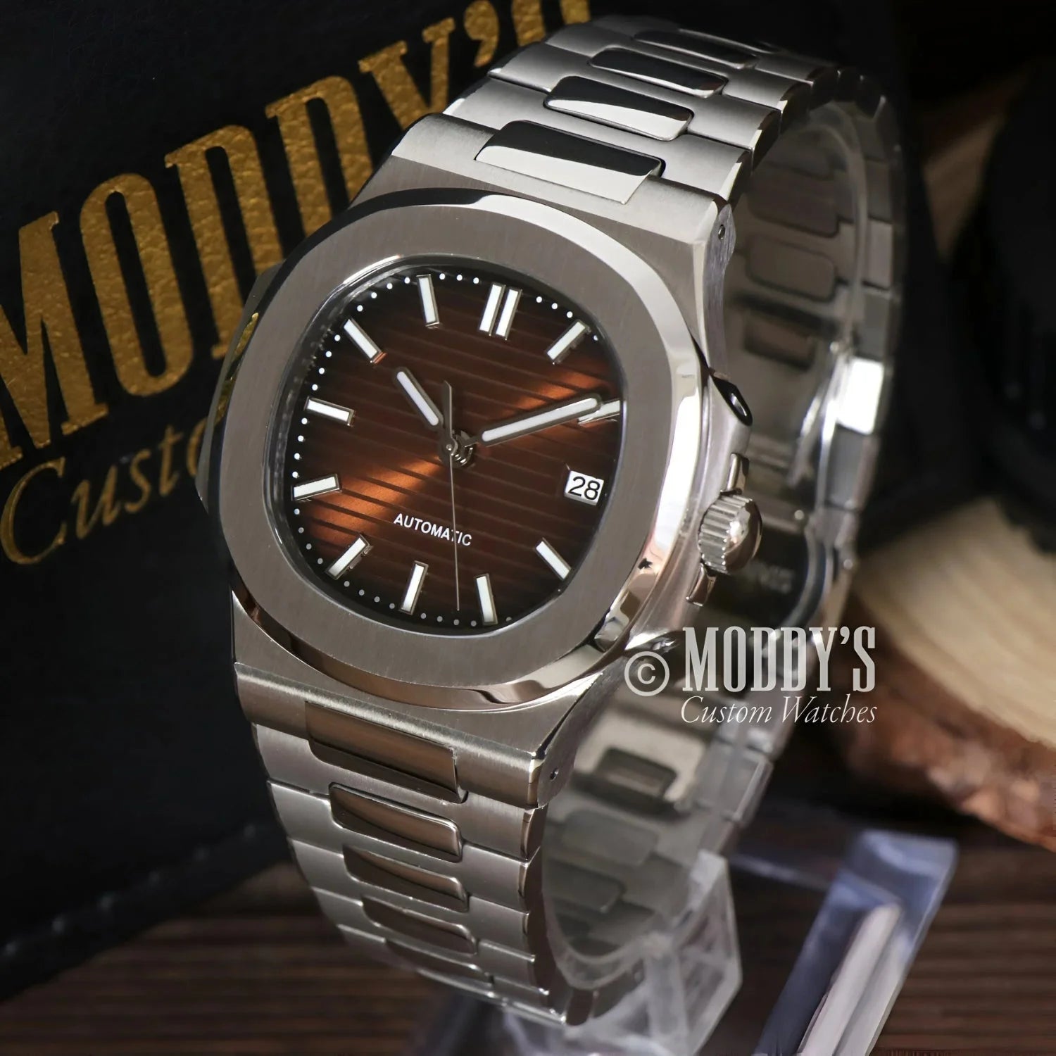 Silver-toned wristwatch with brown face featuring Seiko NH35 automatic movement
