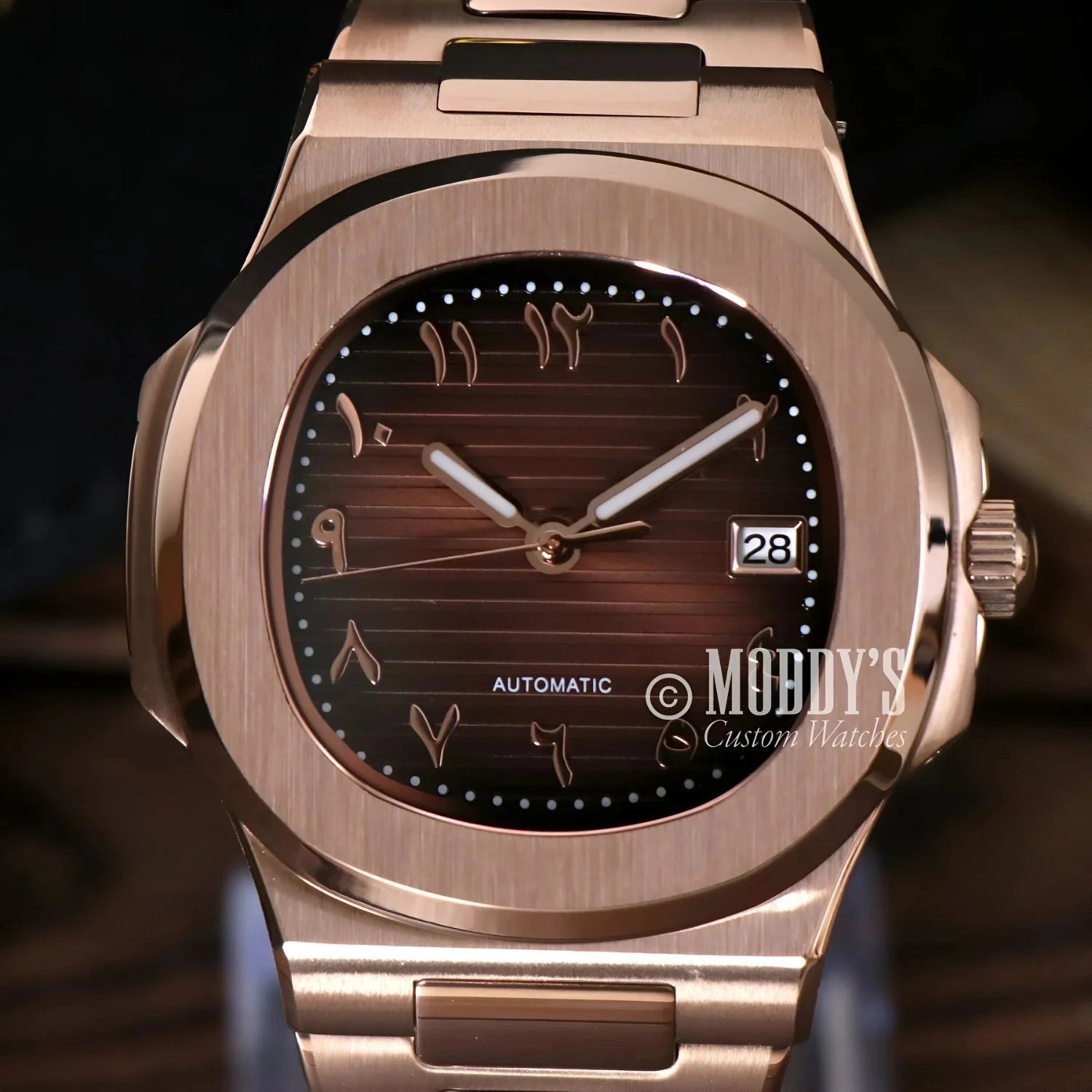 Rose gold Nautiko wristwatch with Arabic numerals and NH35 automatic movement