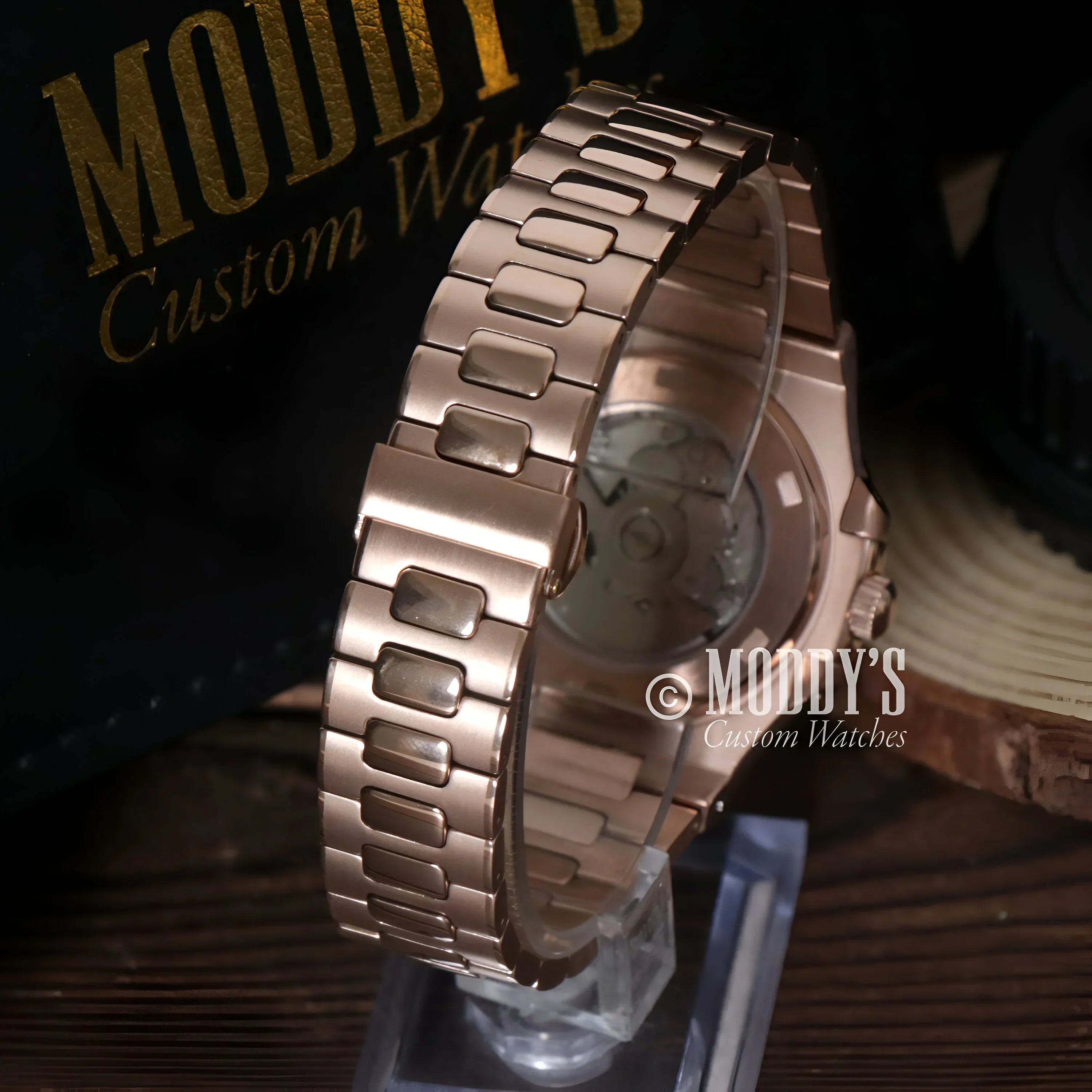 Elegant rose gold wristwatch with metal band featuring NH35 automatic movement