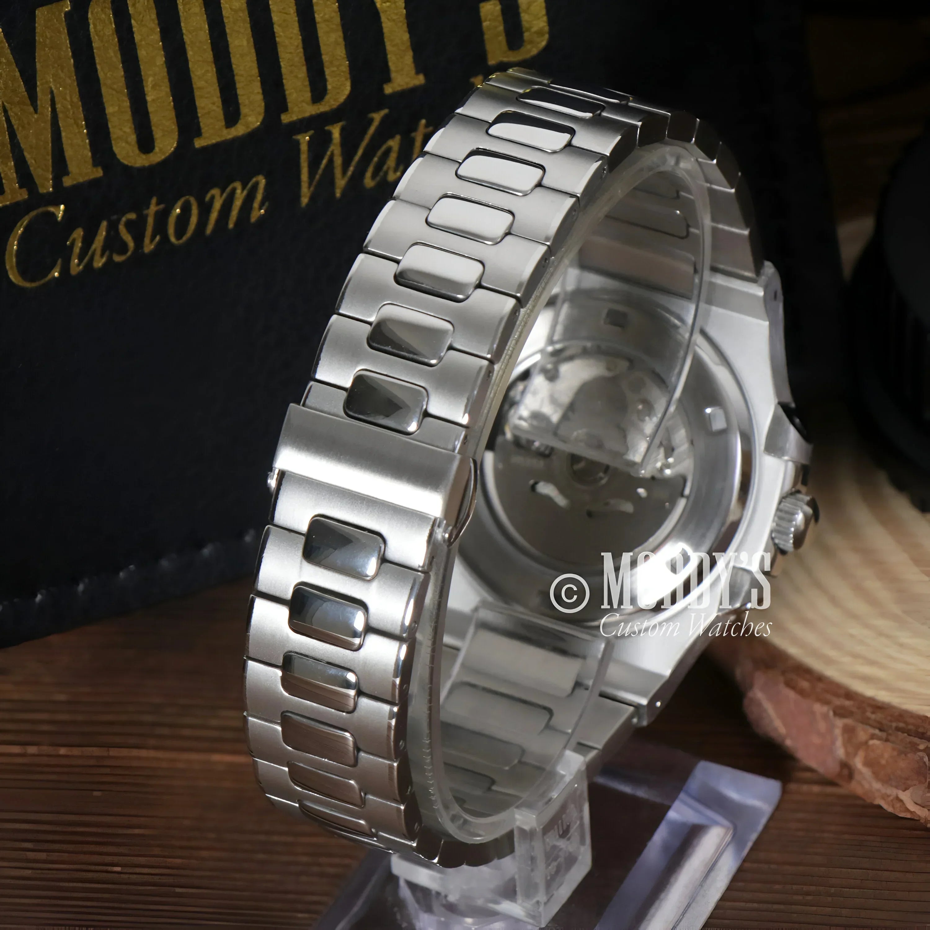 Silver metal Nautiko Black watch featuring NH35 automatic movement and 904L stainless steel