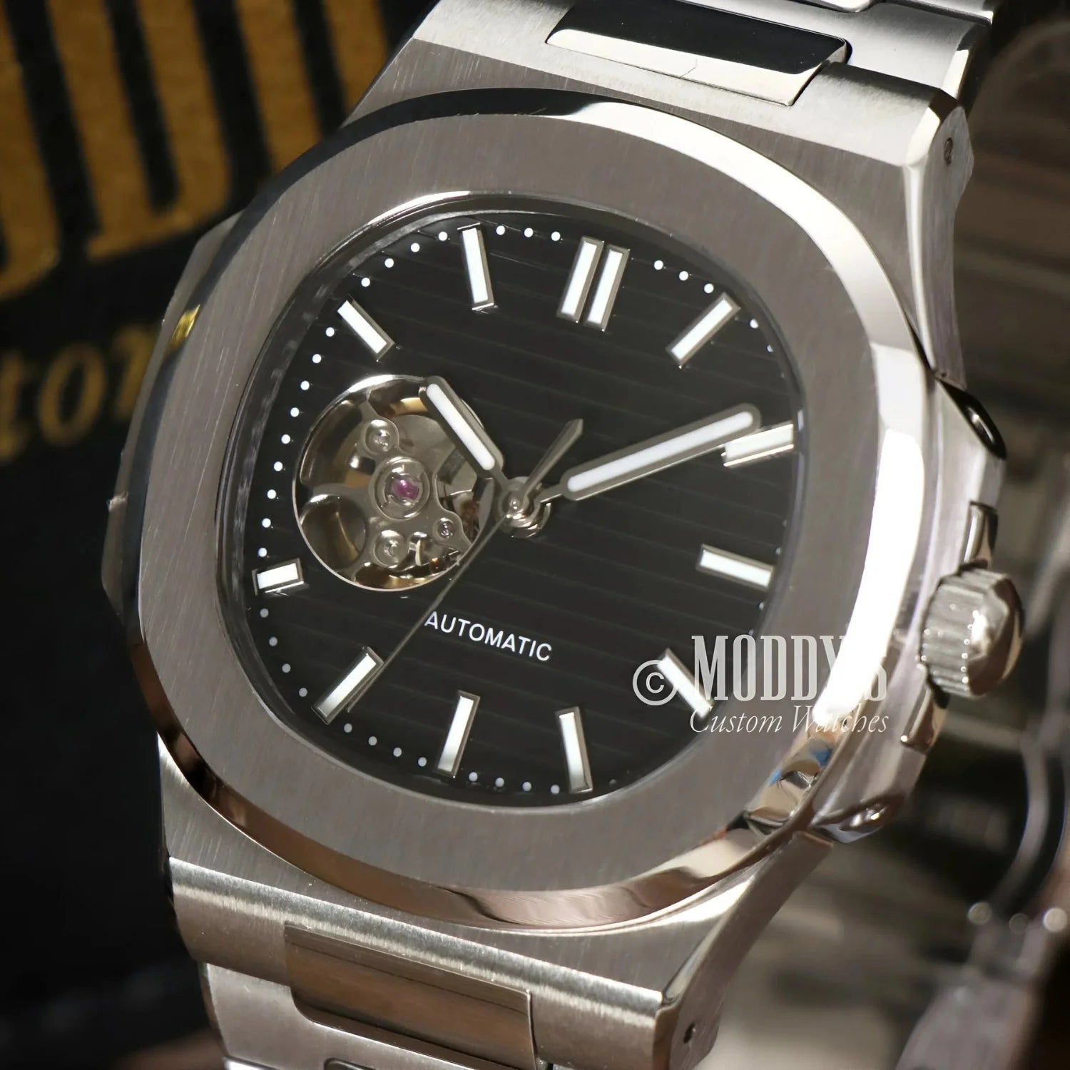 Silver automatic wristwatch featuring NH38 automatic movement in Nautiko Black Open Movement