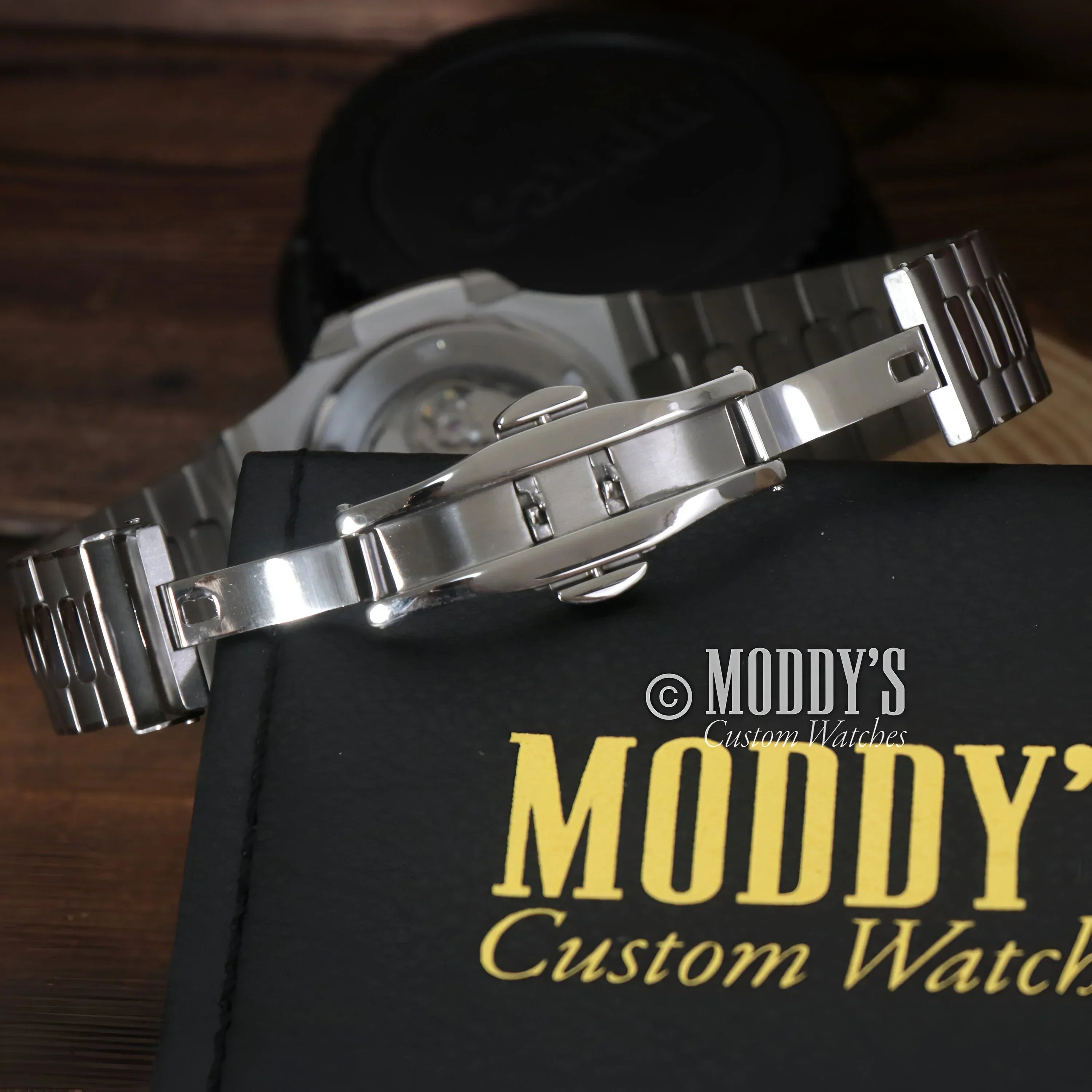 Silver metal watch with clasp features Seiko NH35 automatic movement, Nautiko Cream design