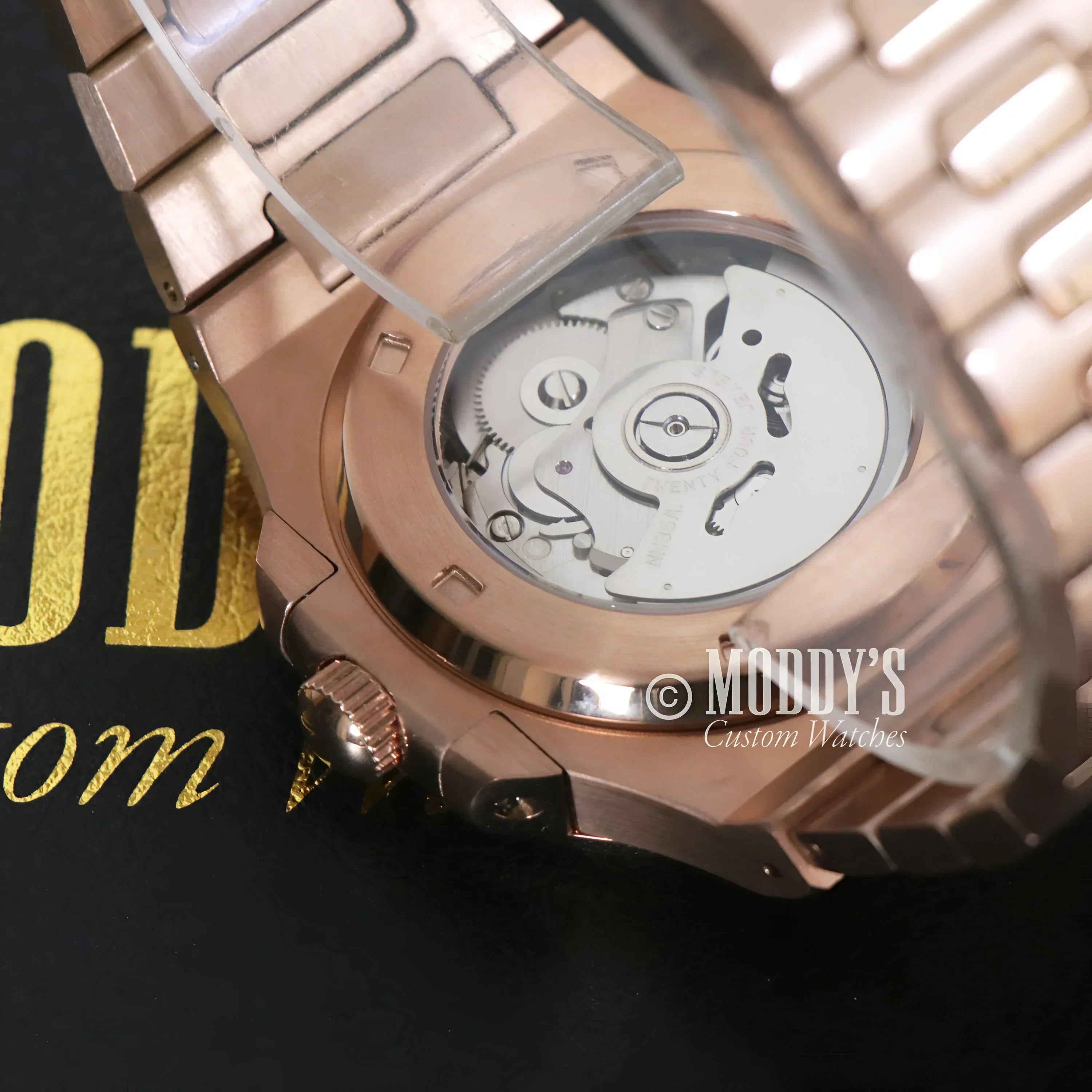 Rose Gold Black Nautiko watch featuring NH35 automatic movement and stylish design