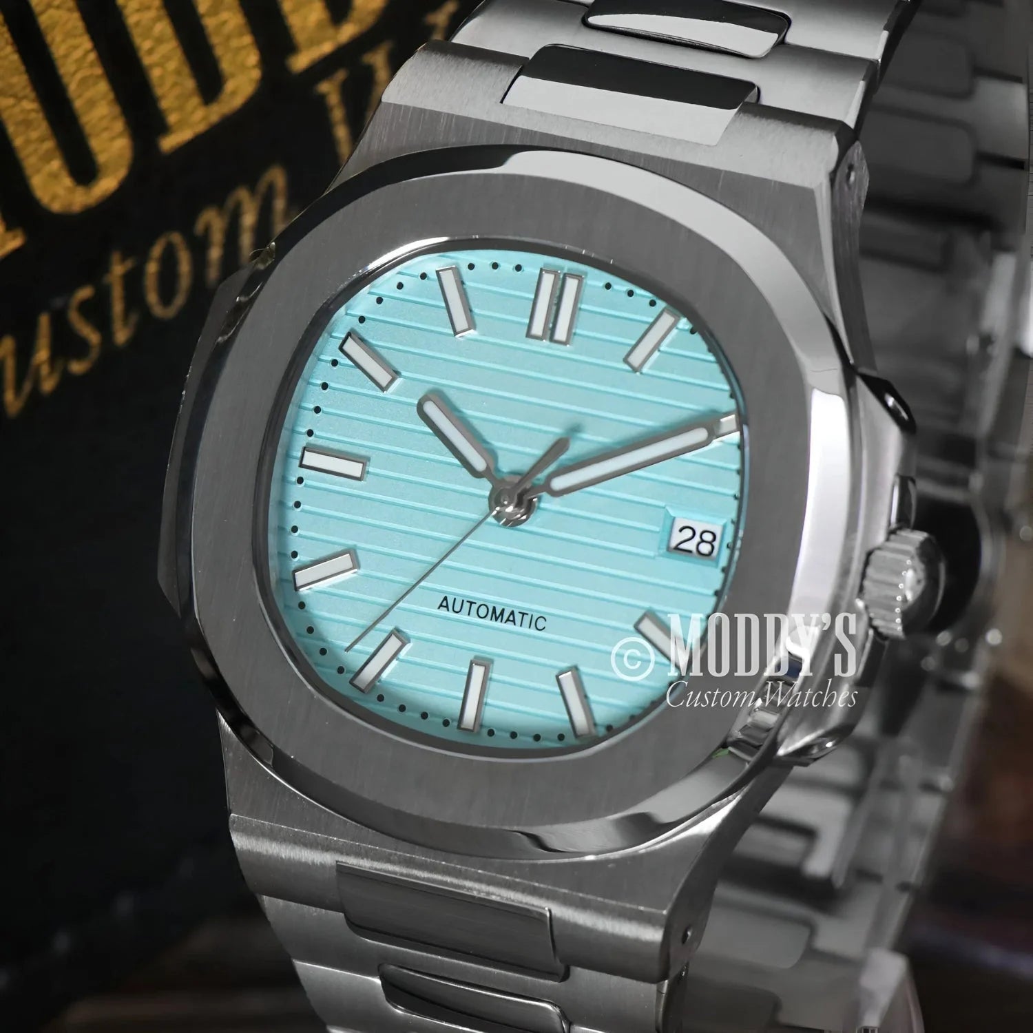 Silver wristwatch with turquoise face, Nautiko in Tiffany Blue, featuring NH35 automatic movement