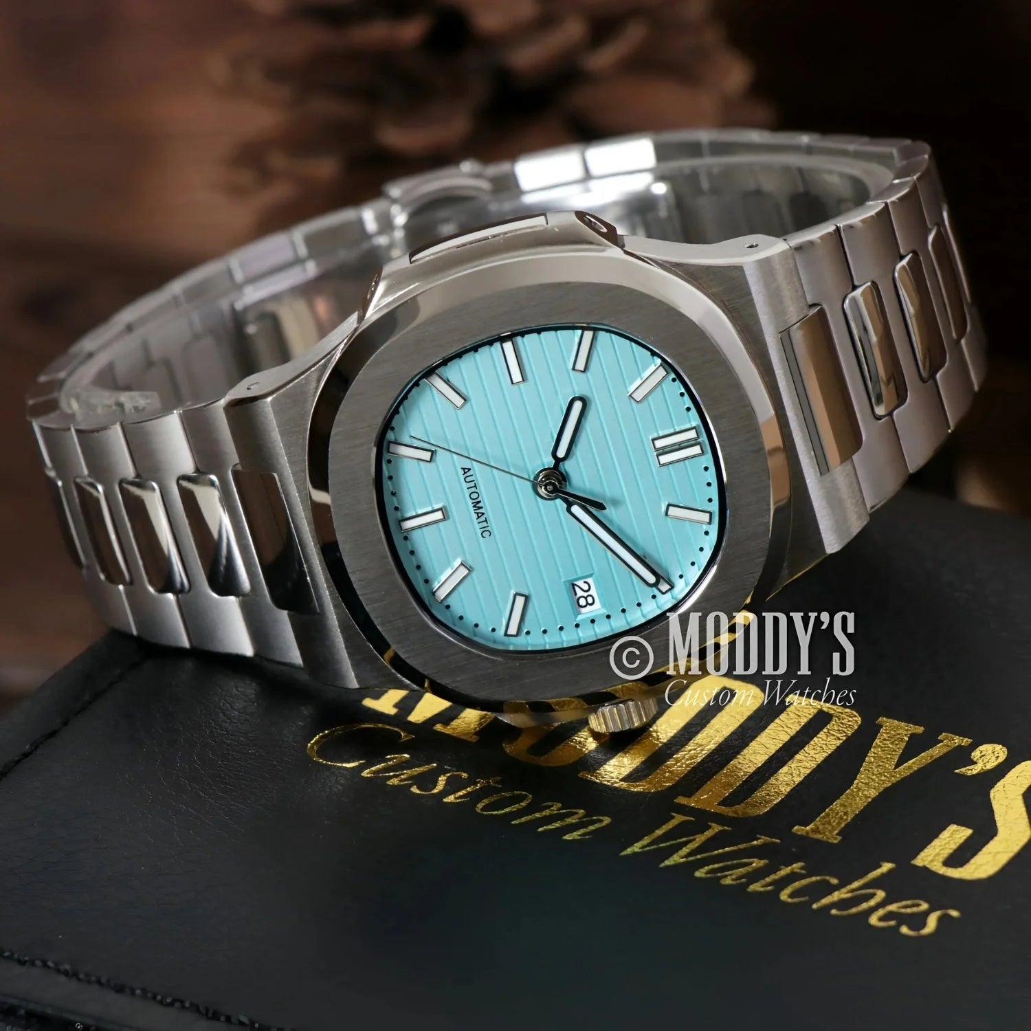 Silver wristwatch with turquoise face, Nautiko Tiffany Blue with NH35 automatic movement