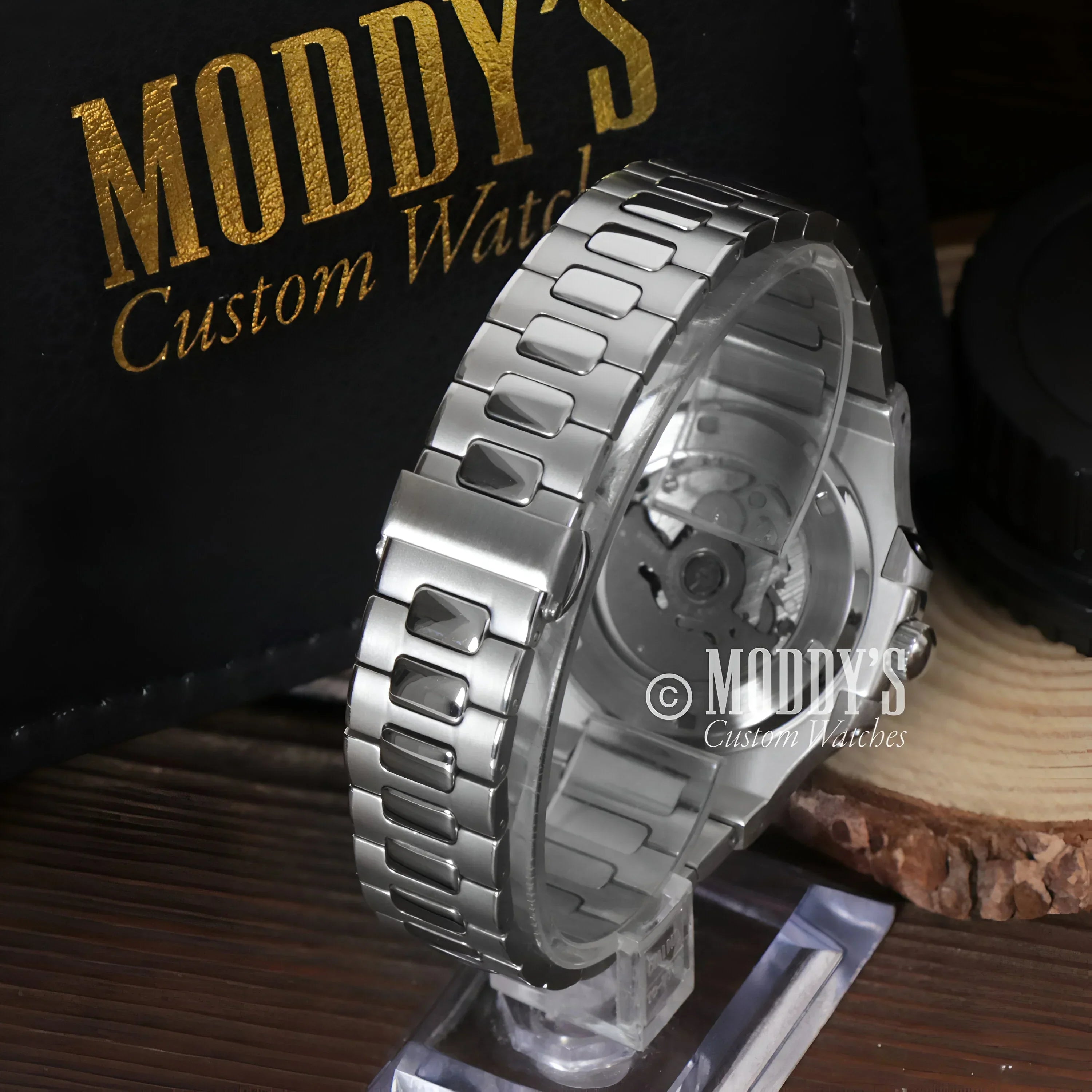 Silver wristwatch with metal band featuring NH35 automatic movement in Tiffany Blue