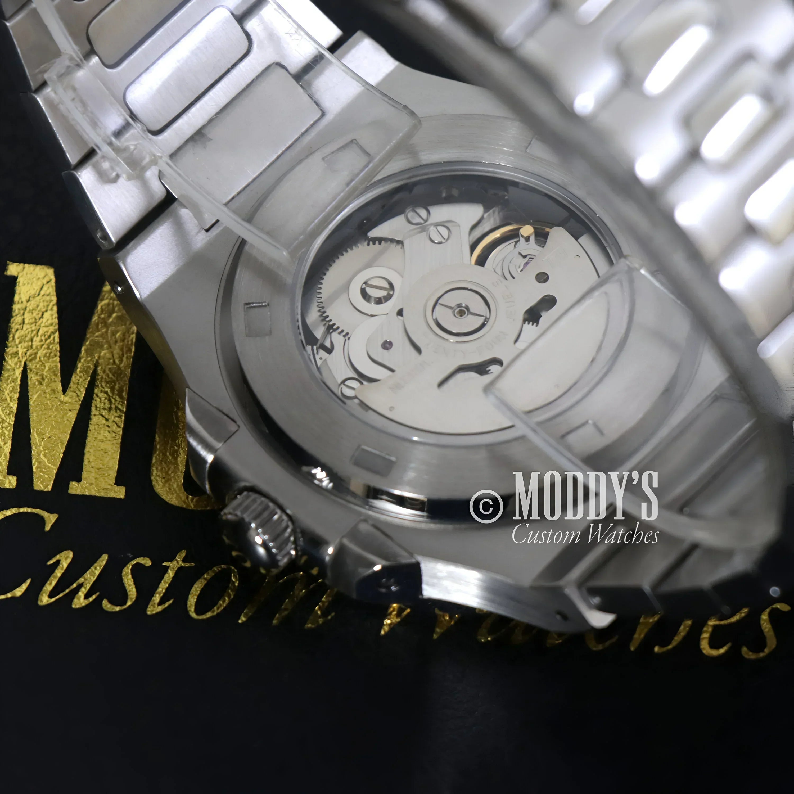 Silver Nautiko White Open Heart wristwatch with exposed movement in 904L stainless steel