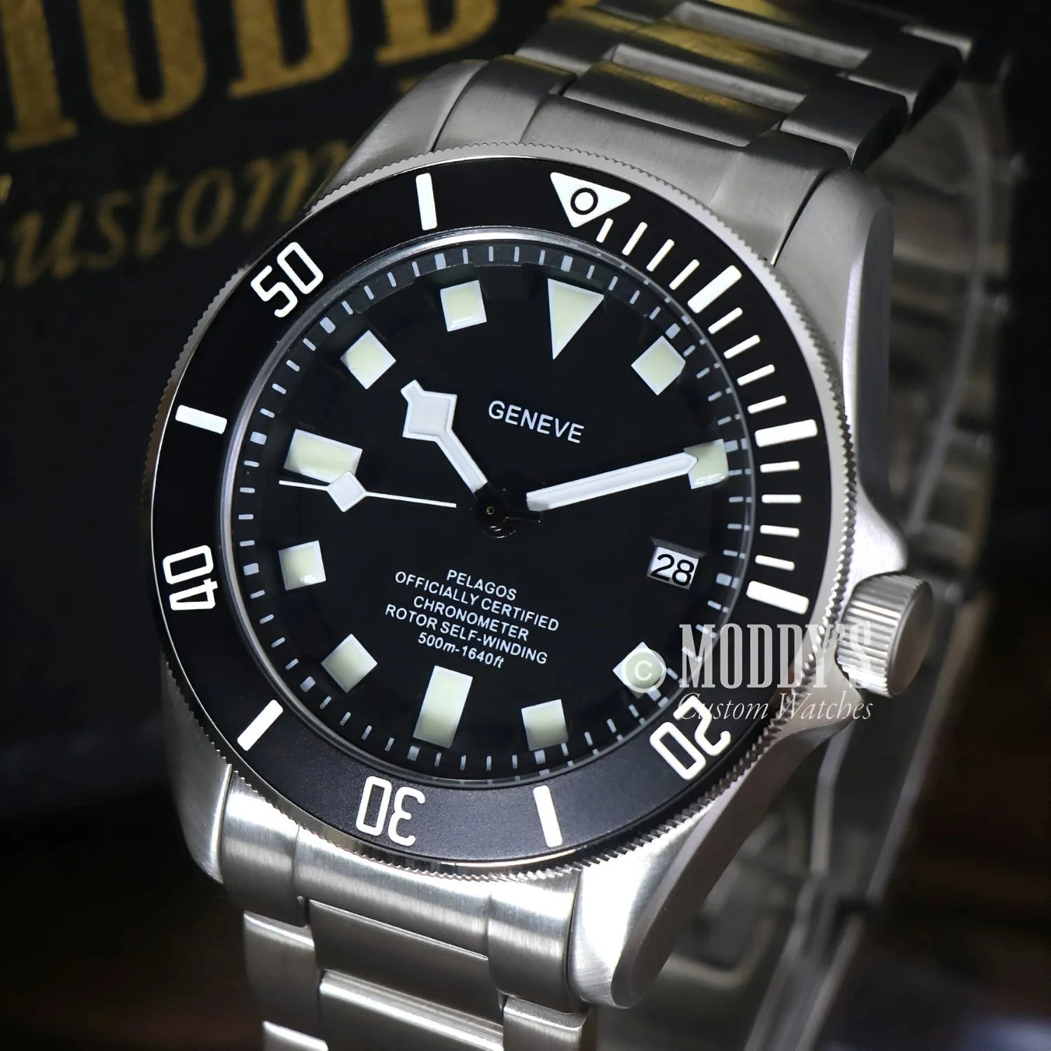 Silver wristwatch with black bezel, Tudeiko Pelagos Black featuring Seiko NH35 automatic movement
