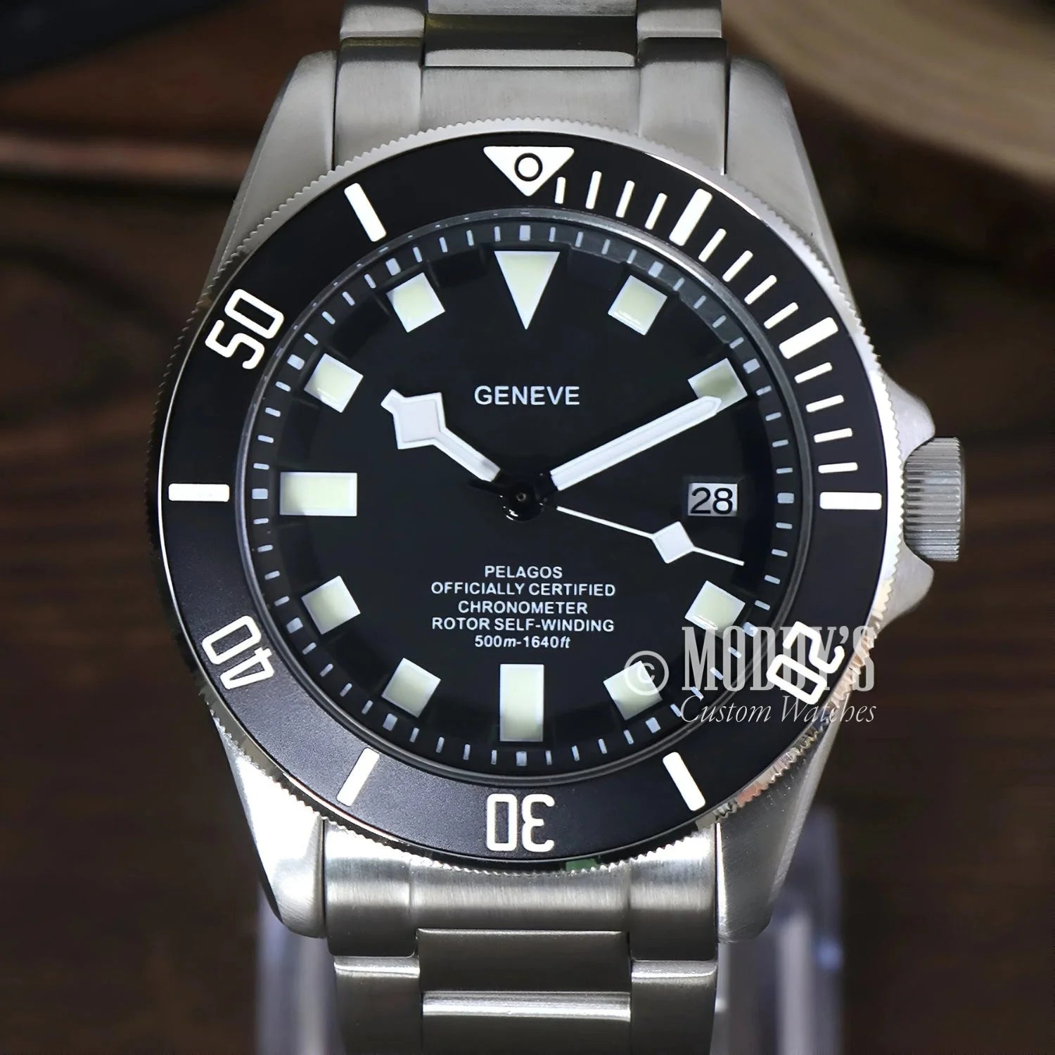 Silver-tone diver’s watch with black dial, Tudeiko Pelagos Black, Seiko NH35 automatic