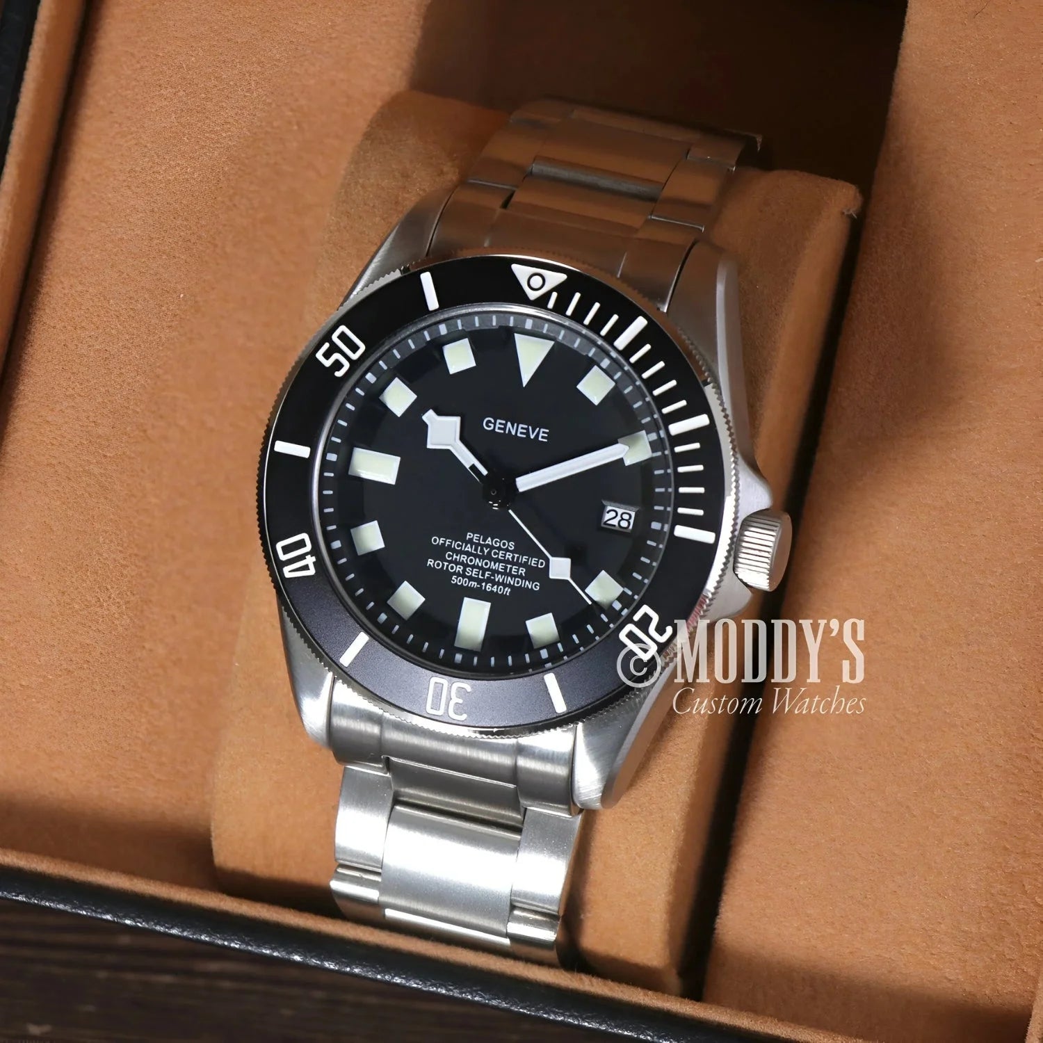 Silver wristwatch with black bezel, Tudeiko Pelagos Black featuring Seiko NH35 automatic