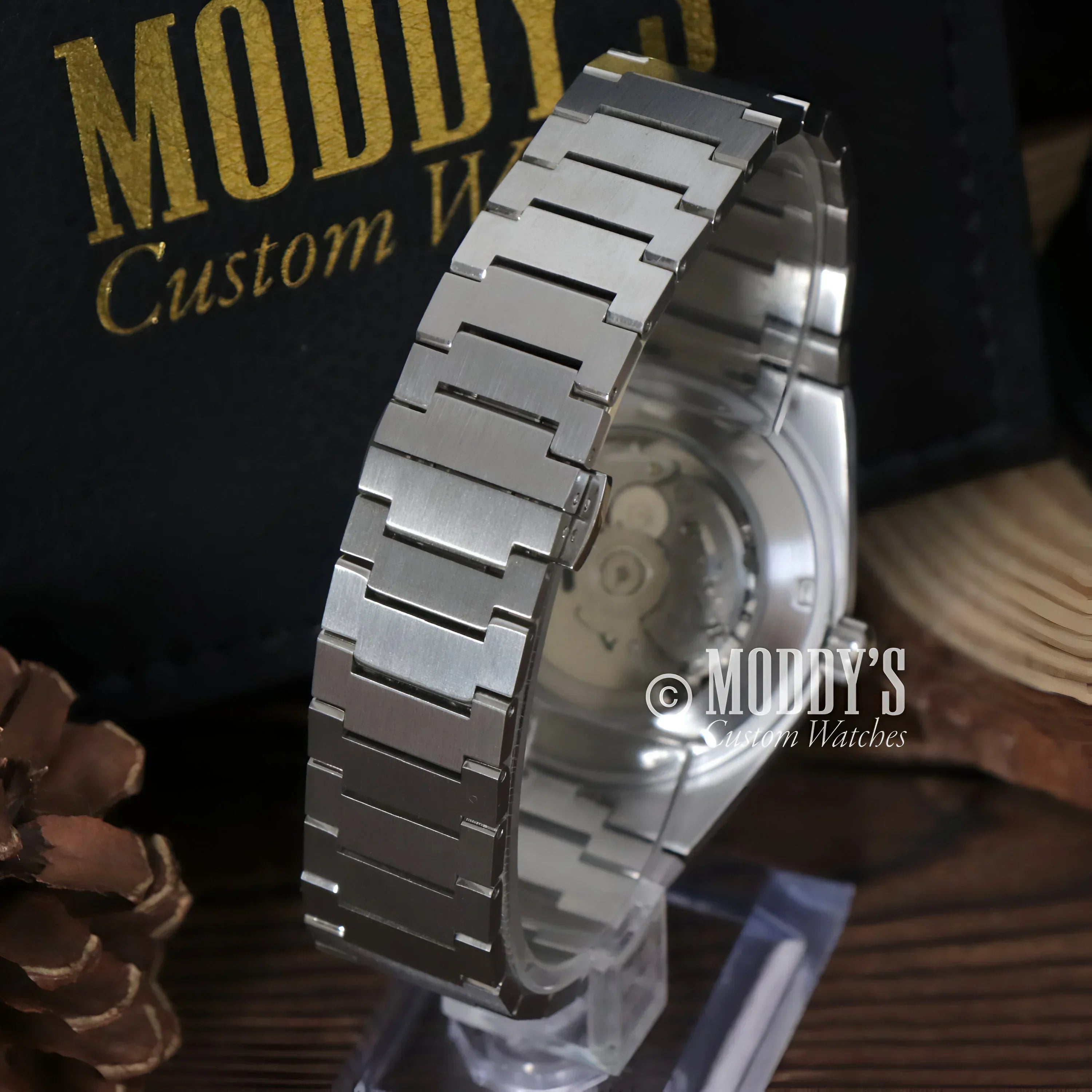 Silver wristwatch with metal band featuring NH35 automatic movement by Seiko Mod