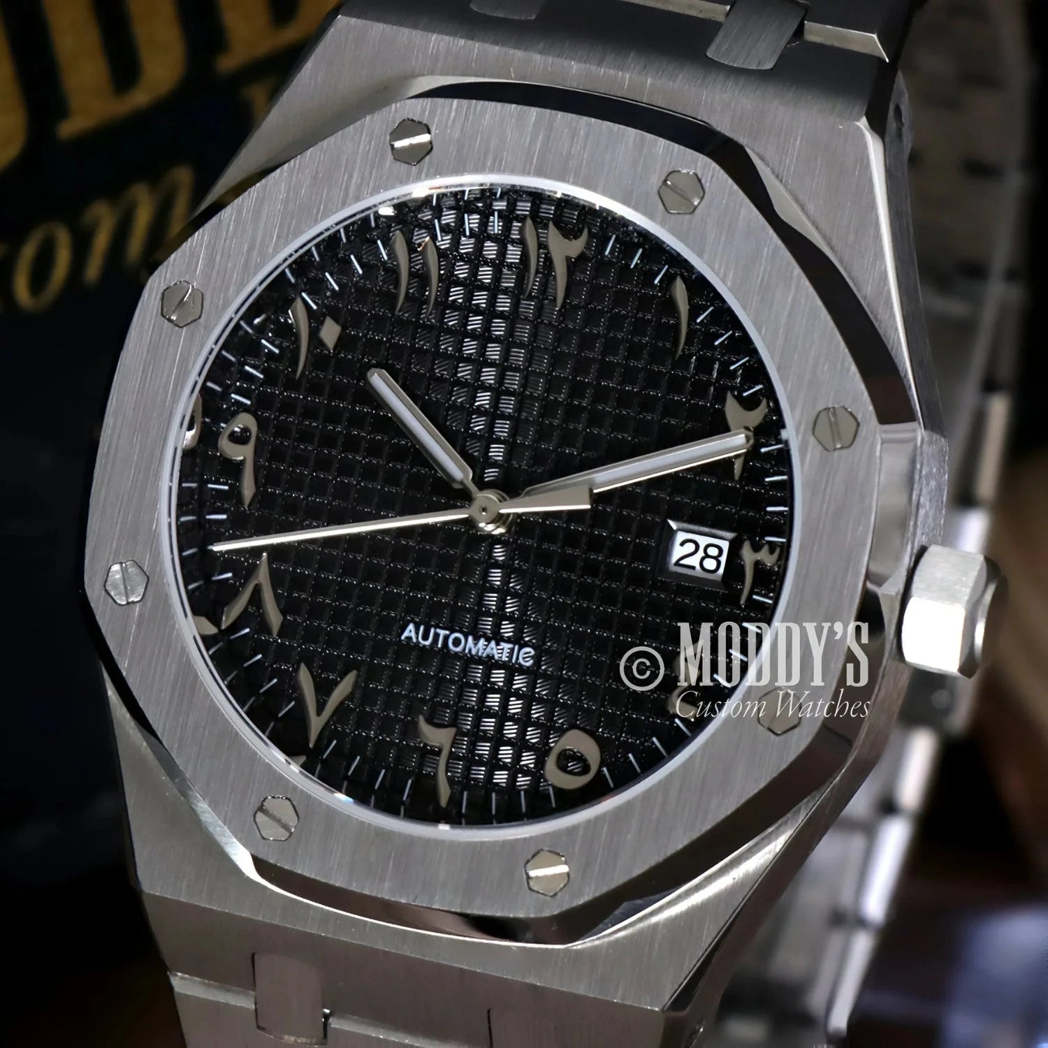 Silver wristwatch featuring Arabic numerals, Royal Seikoak with NH35 automatic movement