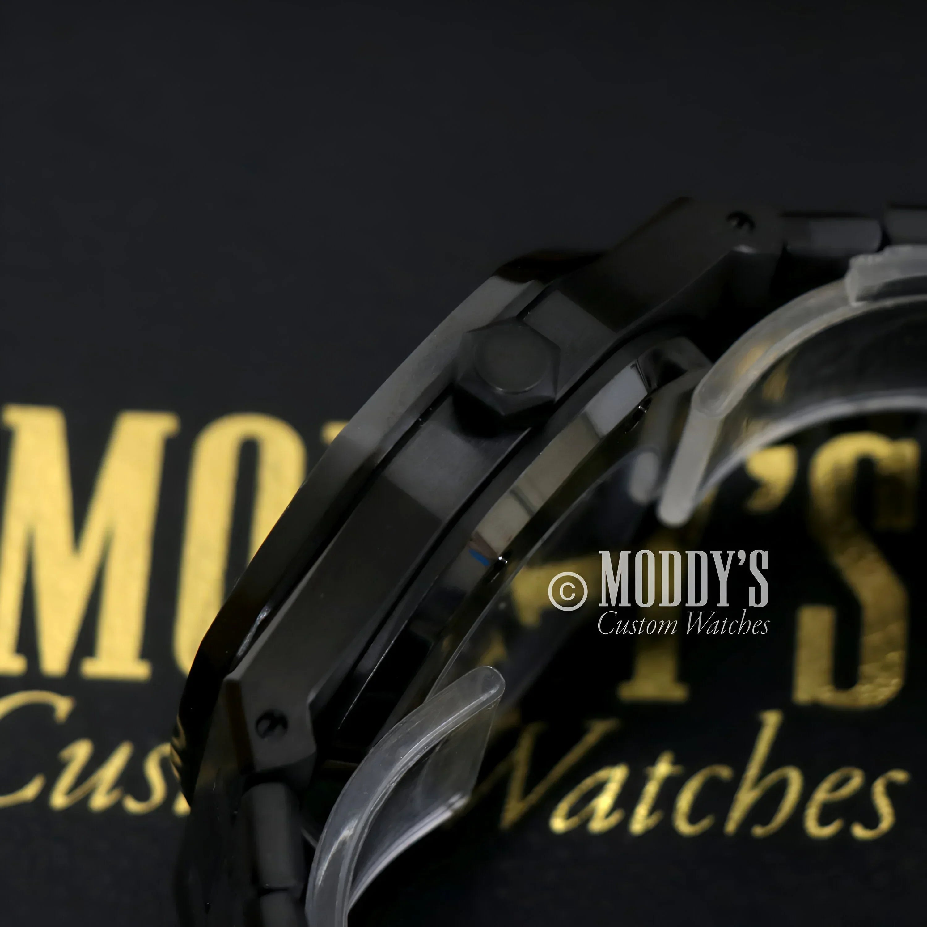 Black wristwatch from Royal Seikoak featuring NH35 automatic movement and stylish design